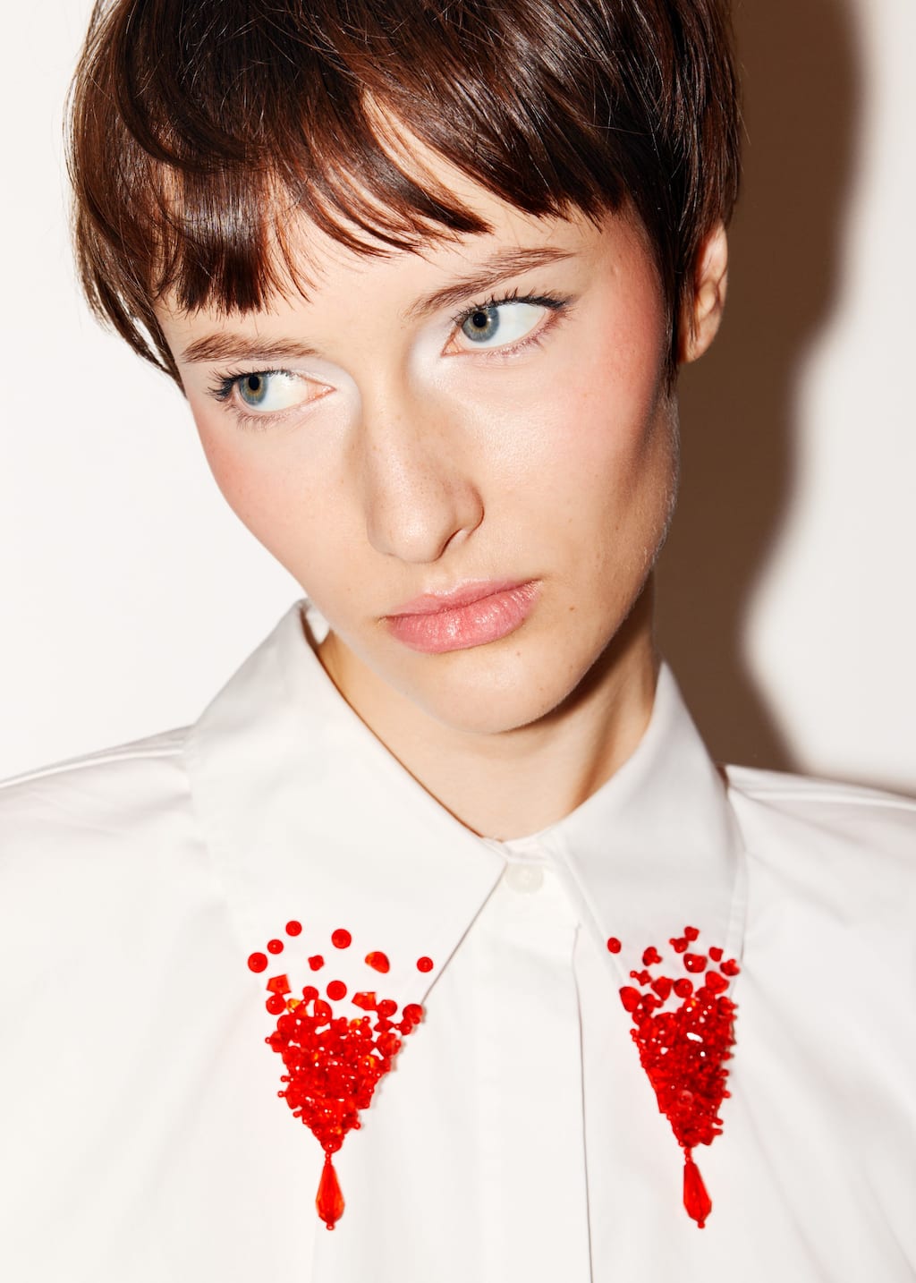 Image of Camisa adornada con cuentas
