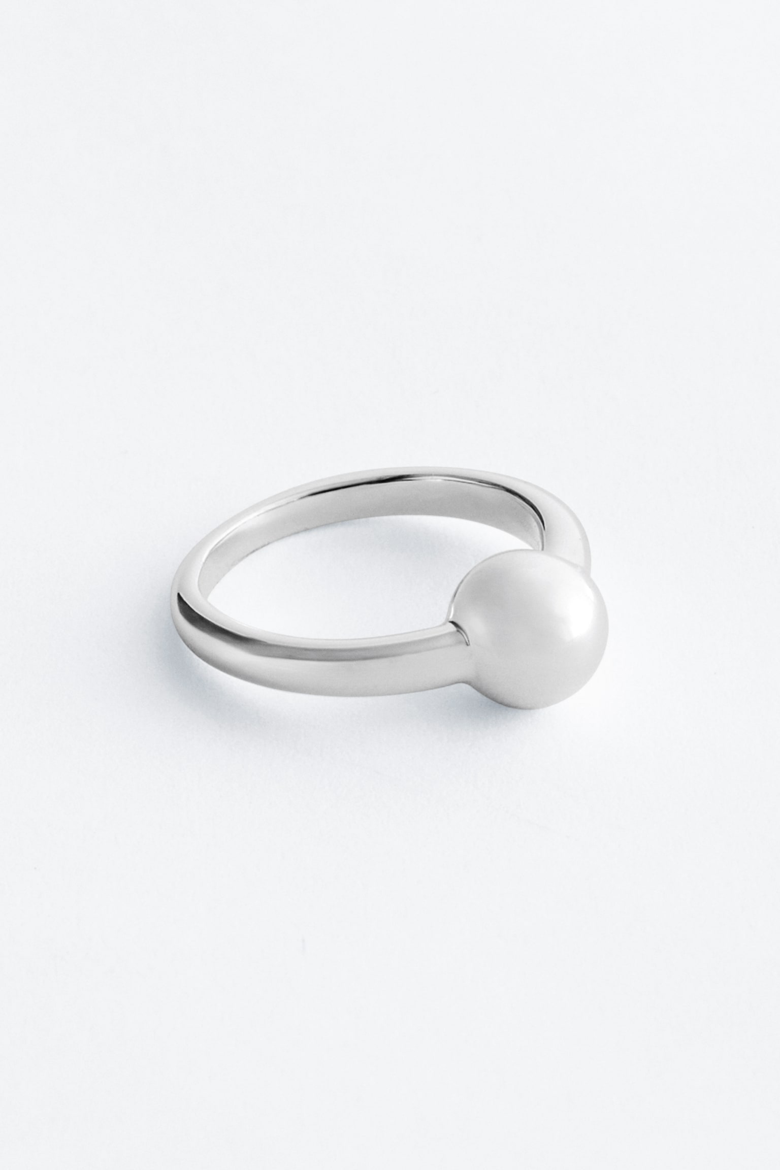 Messing ring met bol - Zilver
