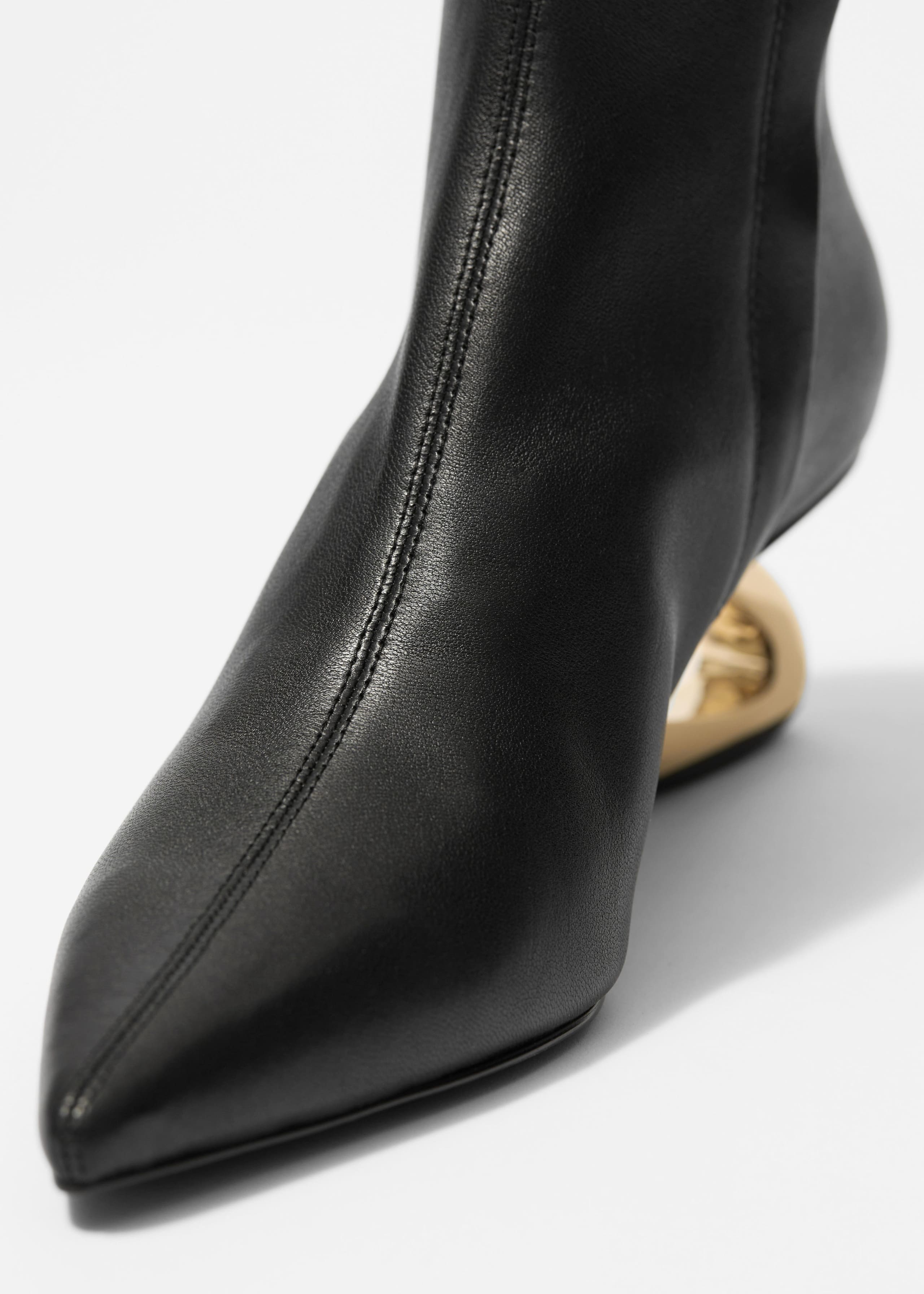 Sculptural Heel Ankle Boots - {{variantName}} - Descriptive Detail