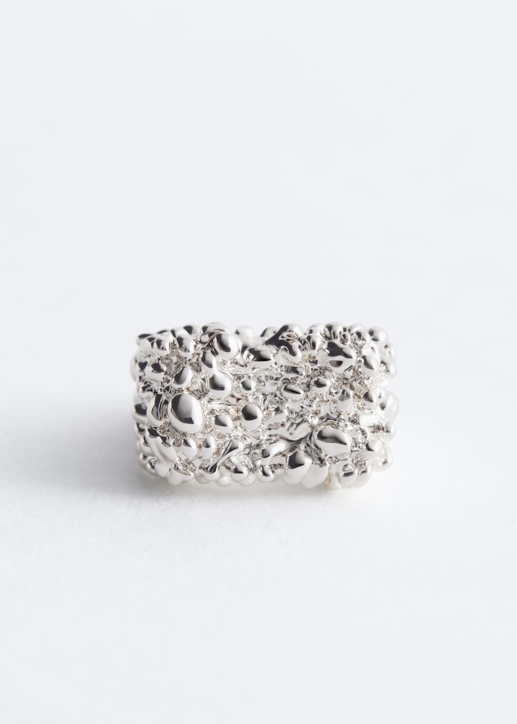 Image of Ring med platt ovansida och texturerad yta