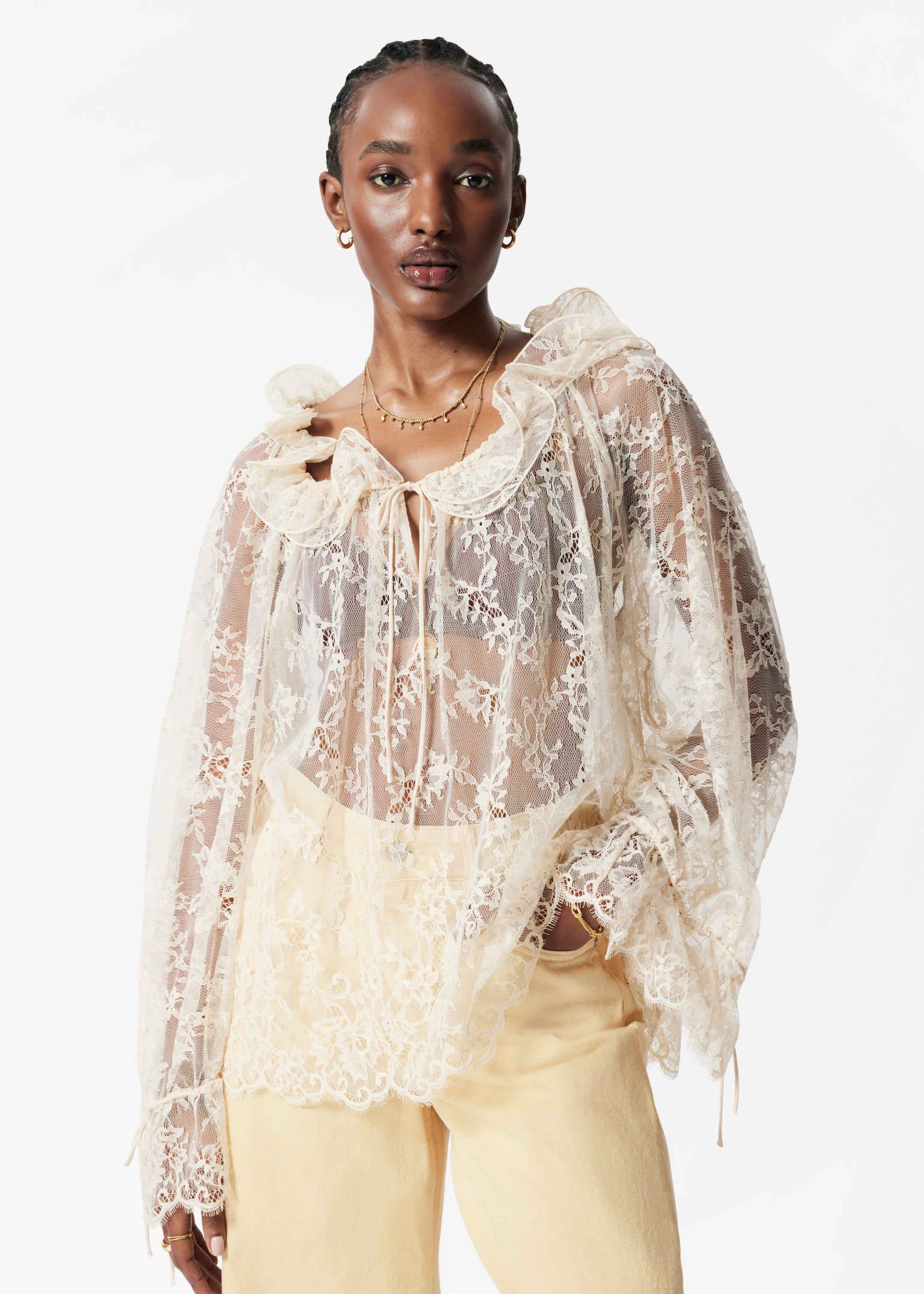 Visualizza immagine più grande: Blusa in pizzo con volant - Crema - DONNA | H&M IT 1