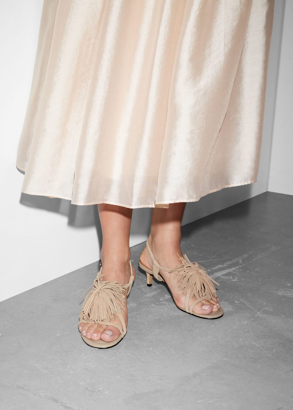 Image of Sandali in pelle con frange