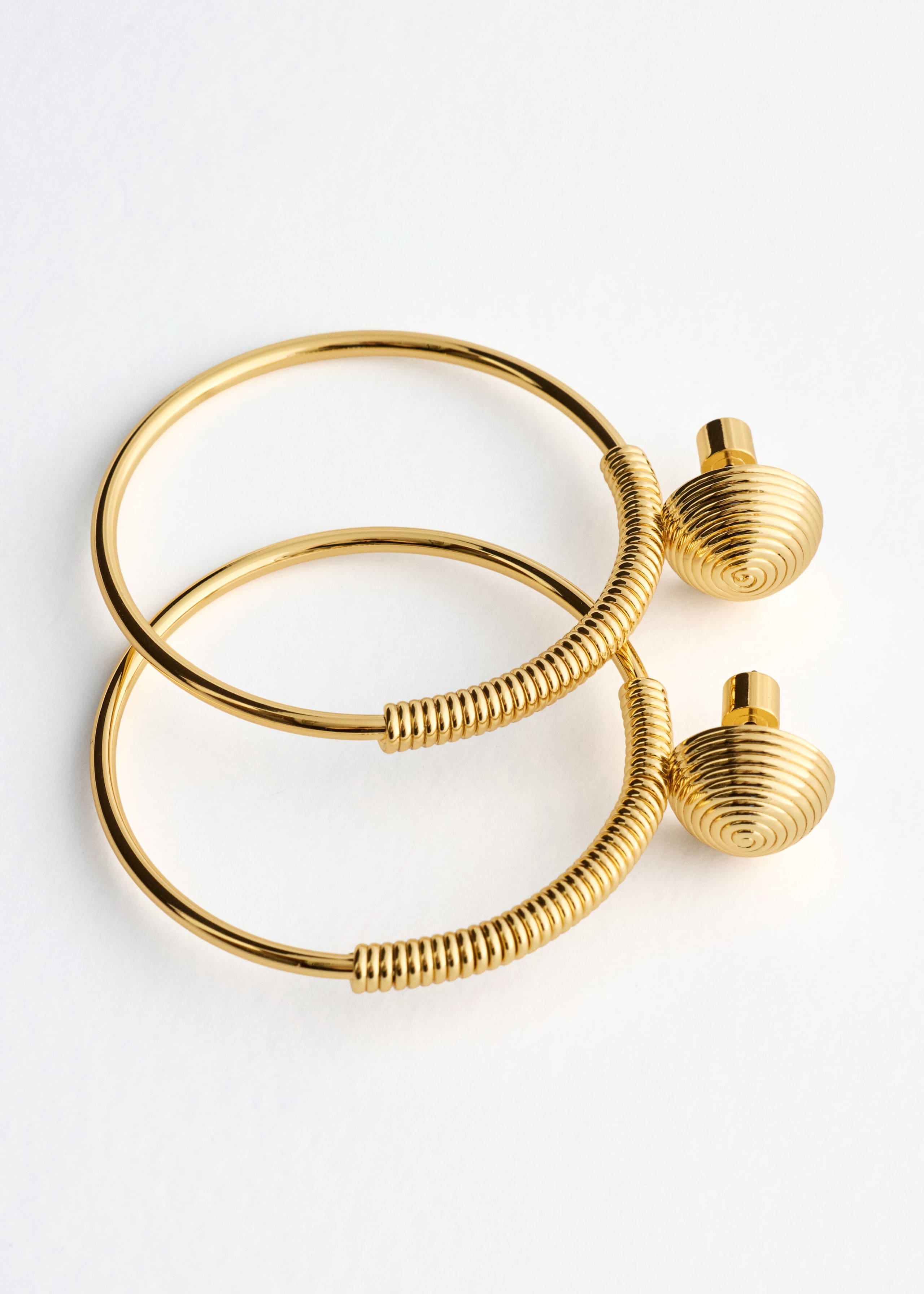 Polished Brass Coil-Detail Hoops - {{variantName}} - Descriptive Detail