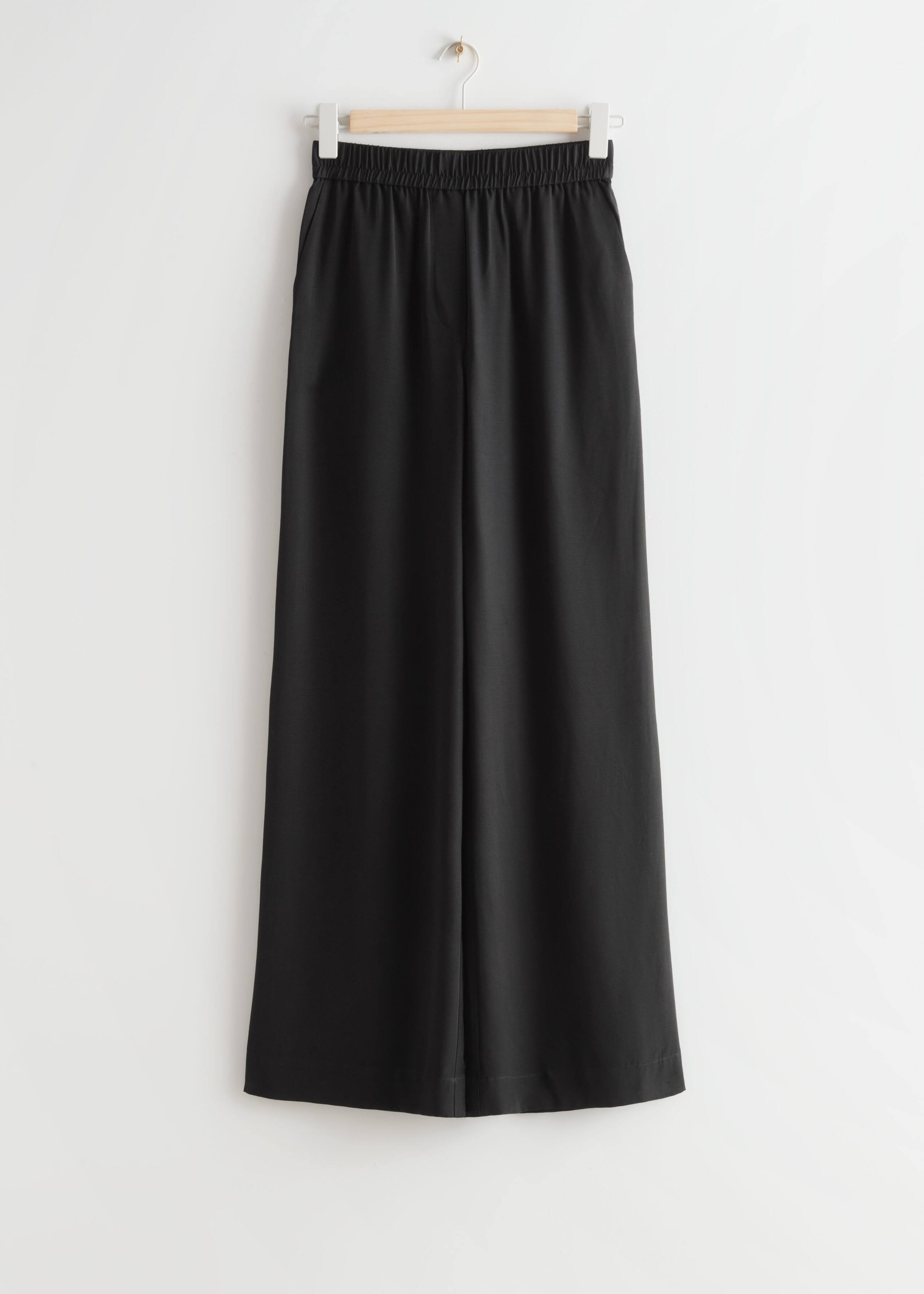 Vida byxor med resår i midjan – Svart – stilleben