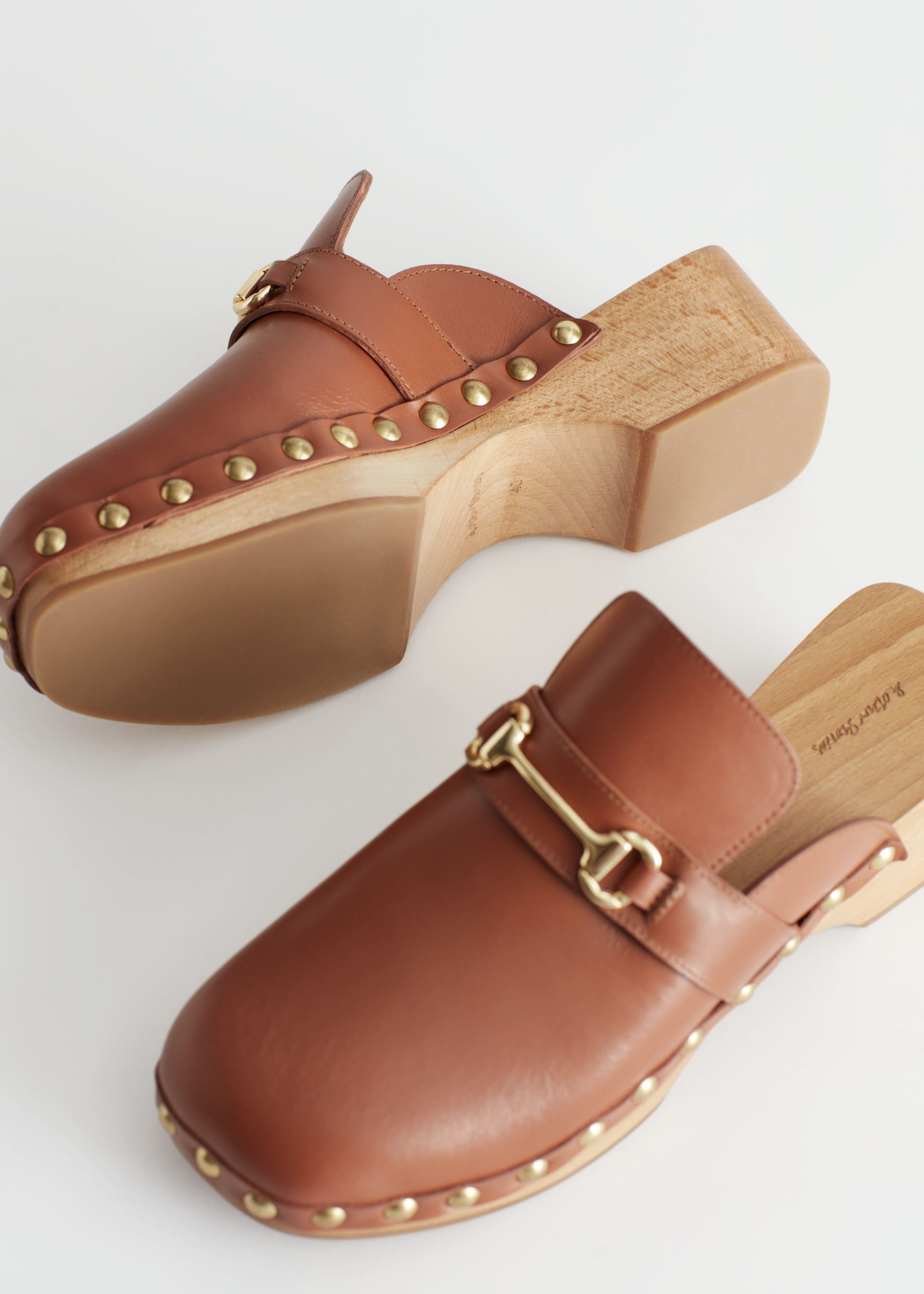 Image of StuddedLeatherWoodenDecoClogs