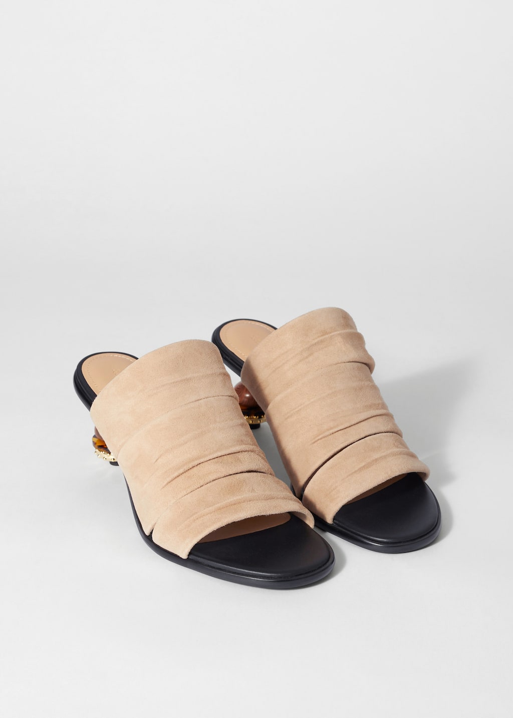 Image of Mules in pelle con dettaglio decorativo