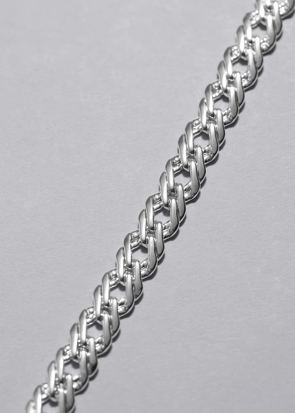 Gliederarmband - {{variantName}} - Beschreibendes Detail