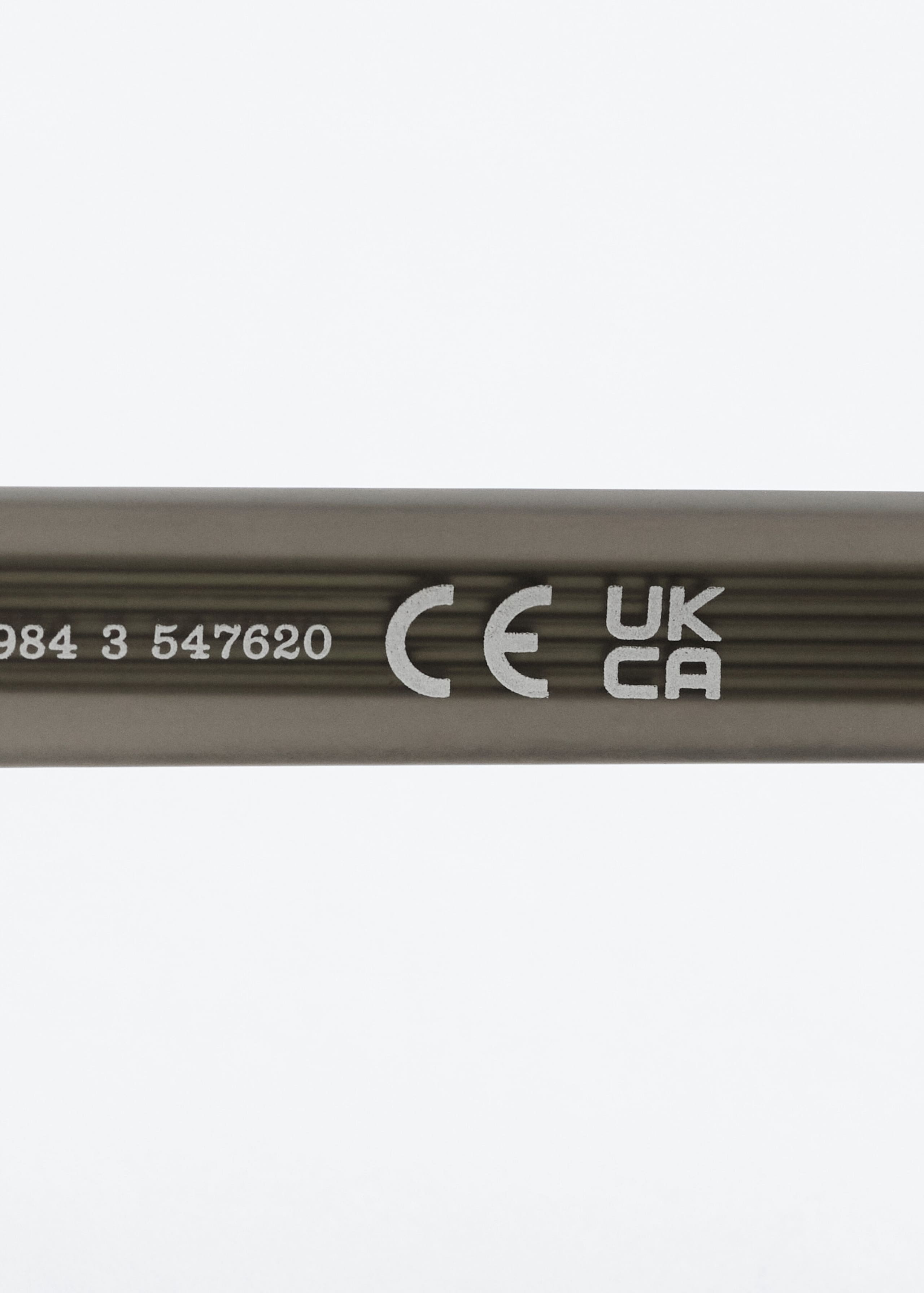 Sculpted Oval Sunglasses - {{variantName}} - Descriptive Detail