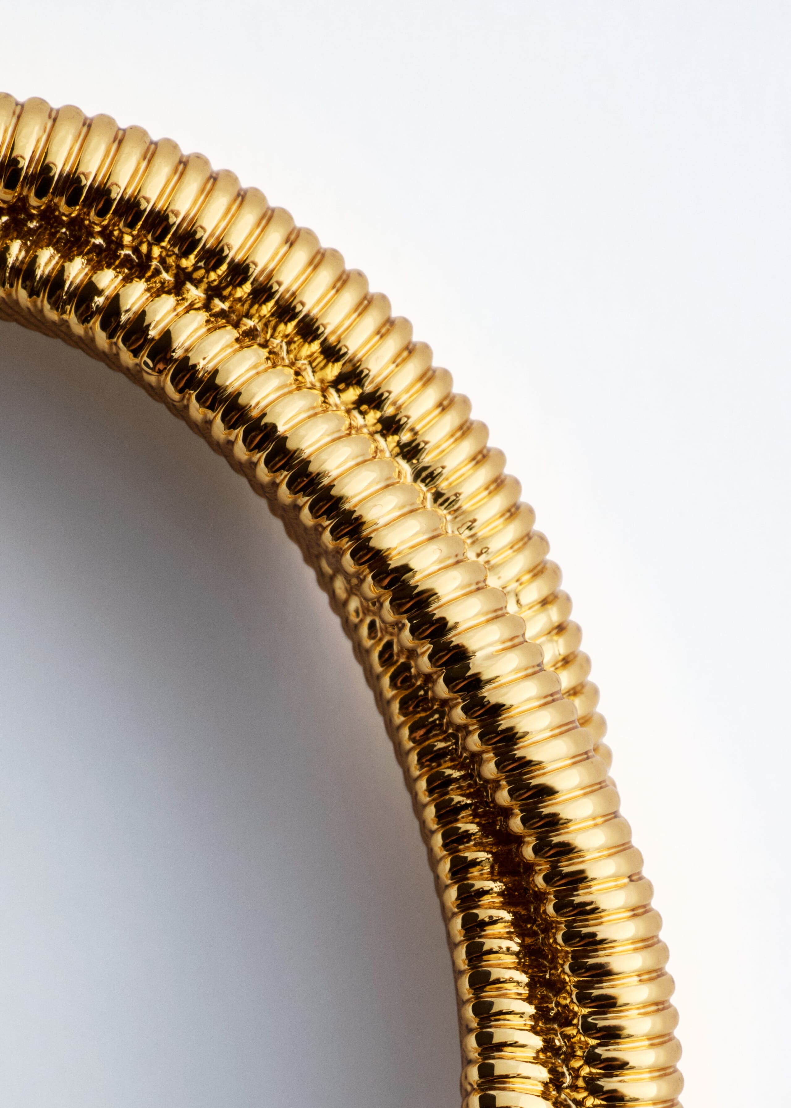 Plated Brass Twist Cuff - {{variantName}} - Descriptive Detail