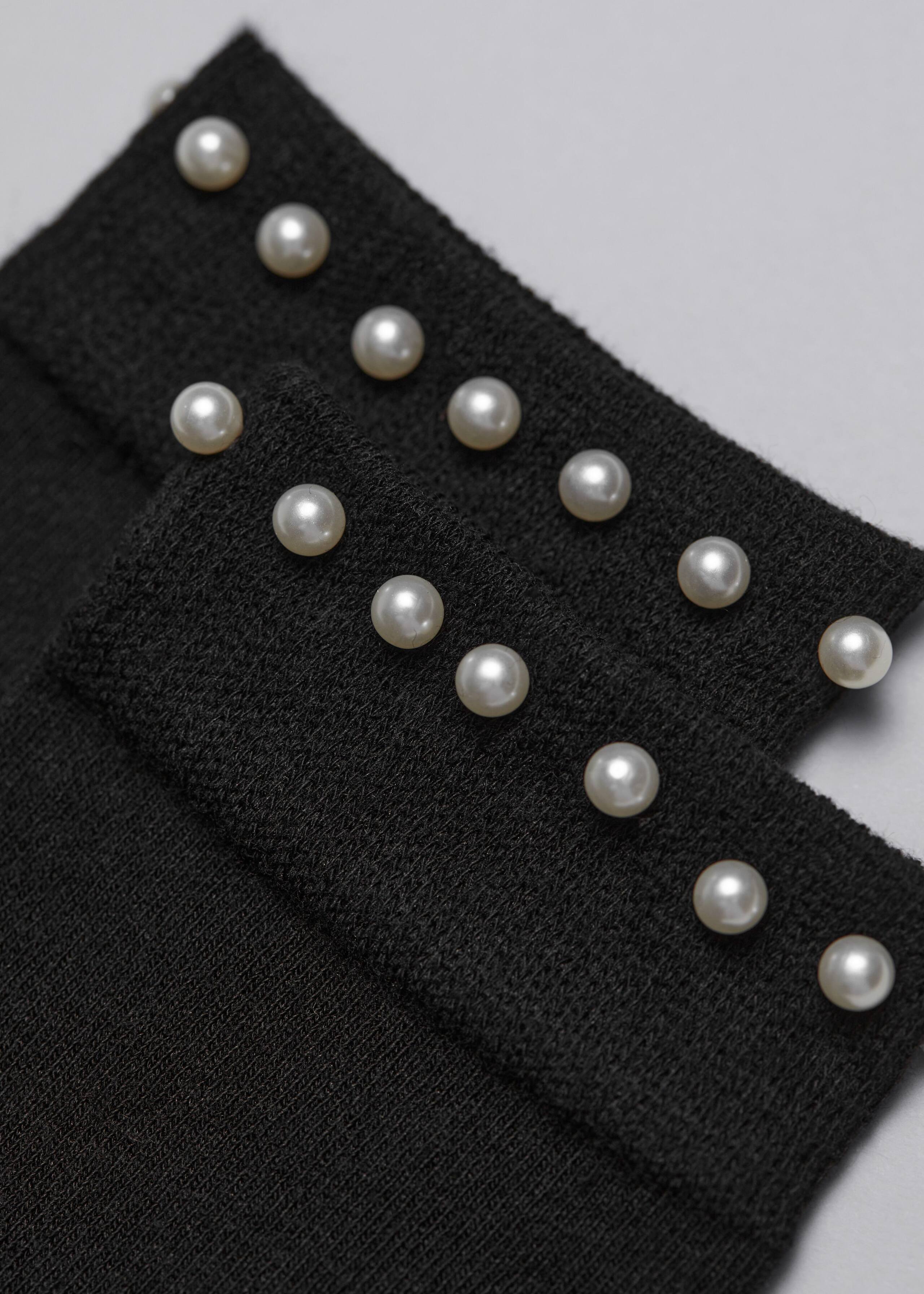 Socken mit Perlenverzierung - {{variantName}} - Beschreibendes Detail