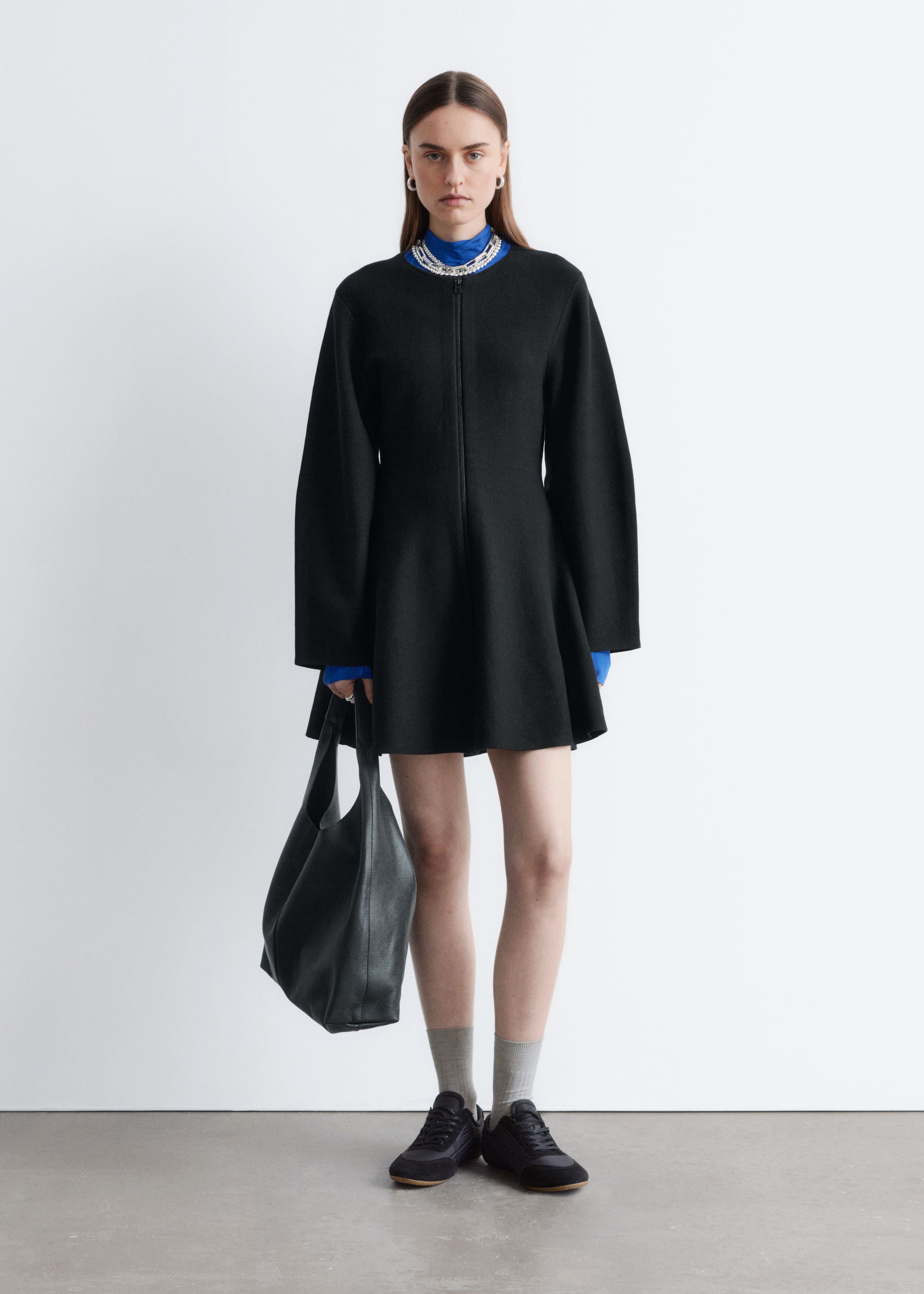 Image of Sculptural-Sleeve Knitted Mini Dress