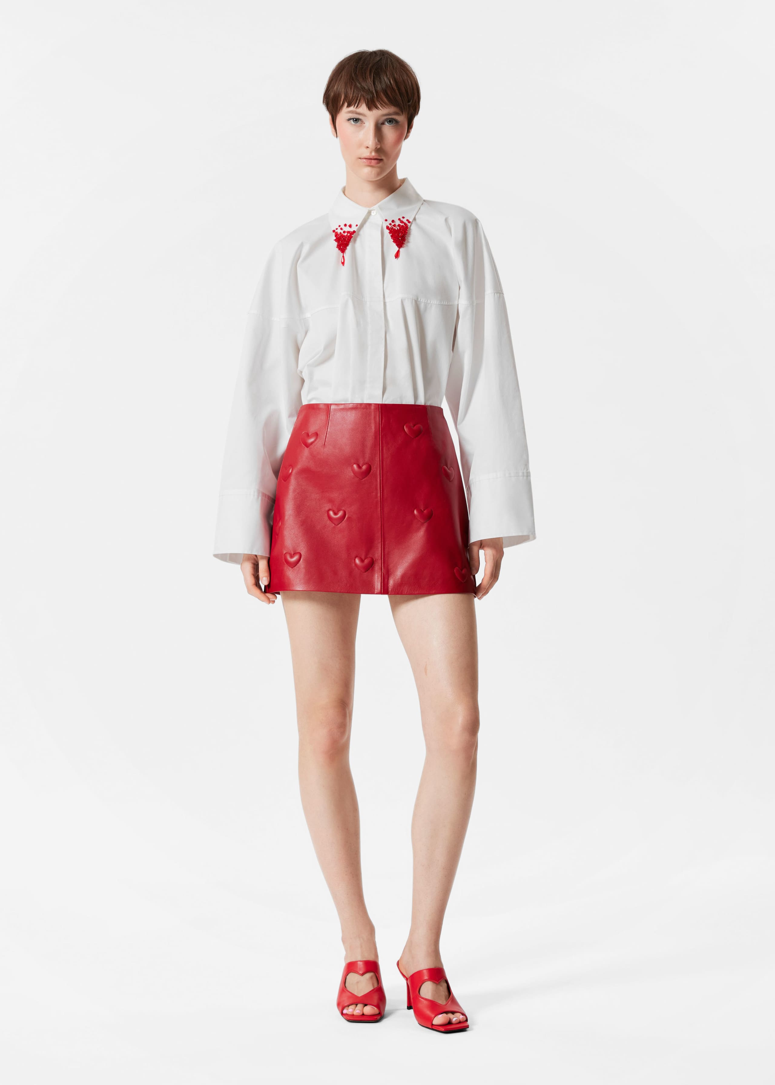 Image of Heart-Embossed Leather Mini Skirt