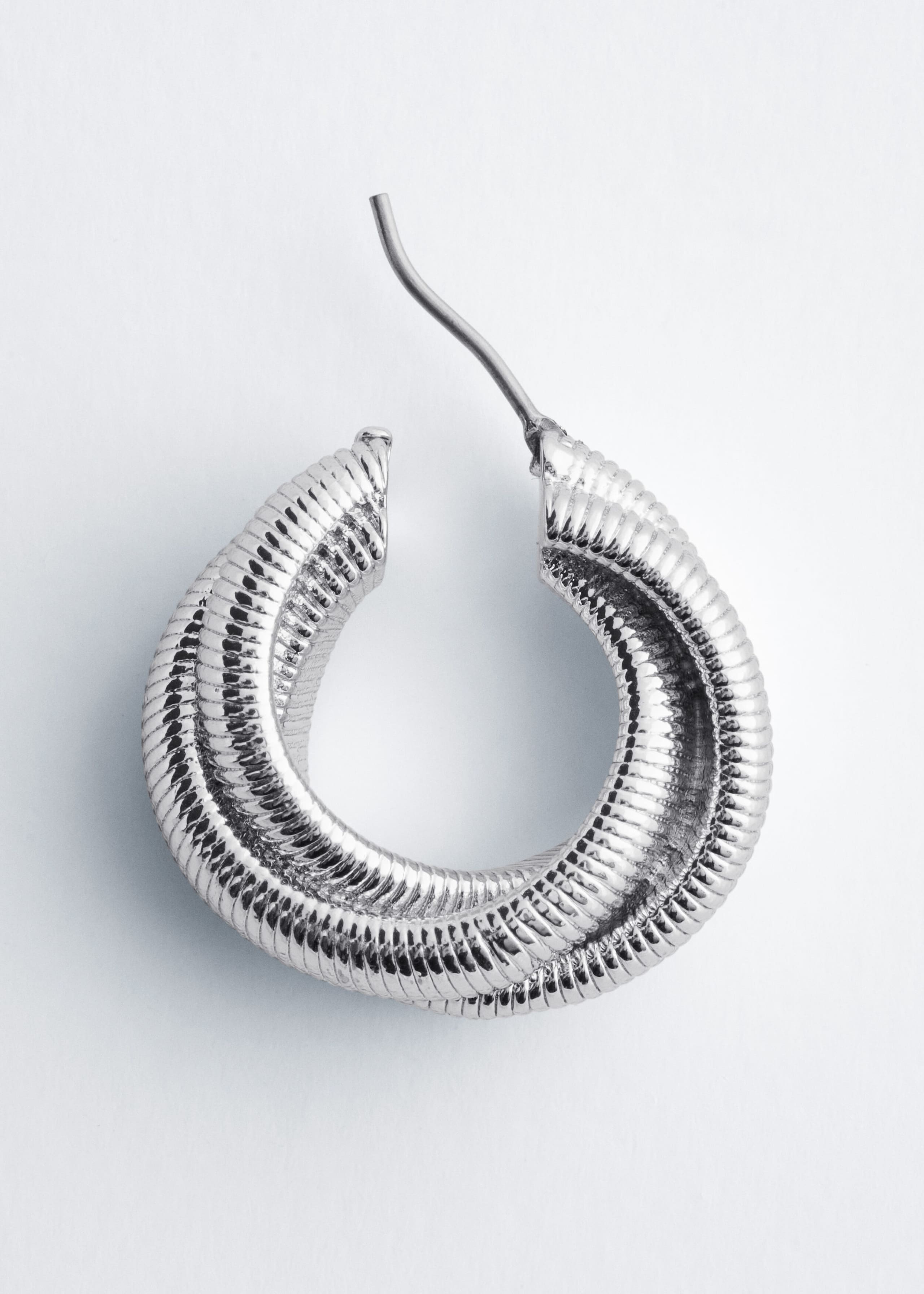 Plated Brass Twisted Hoops - {{variantName}} - Descriptive Detail