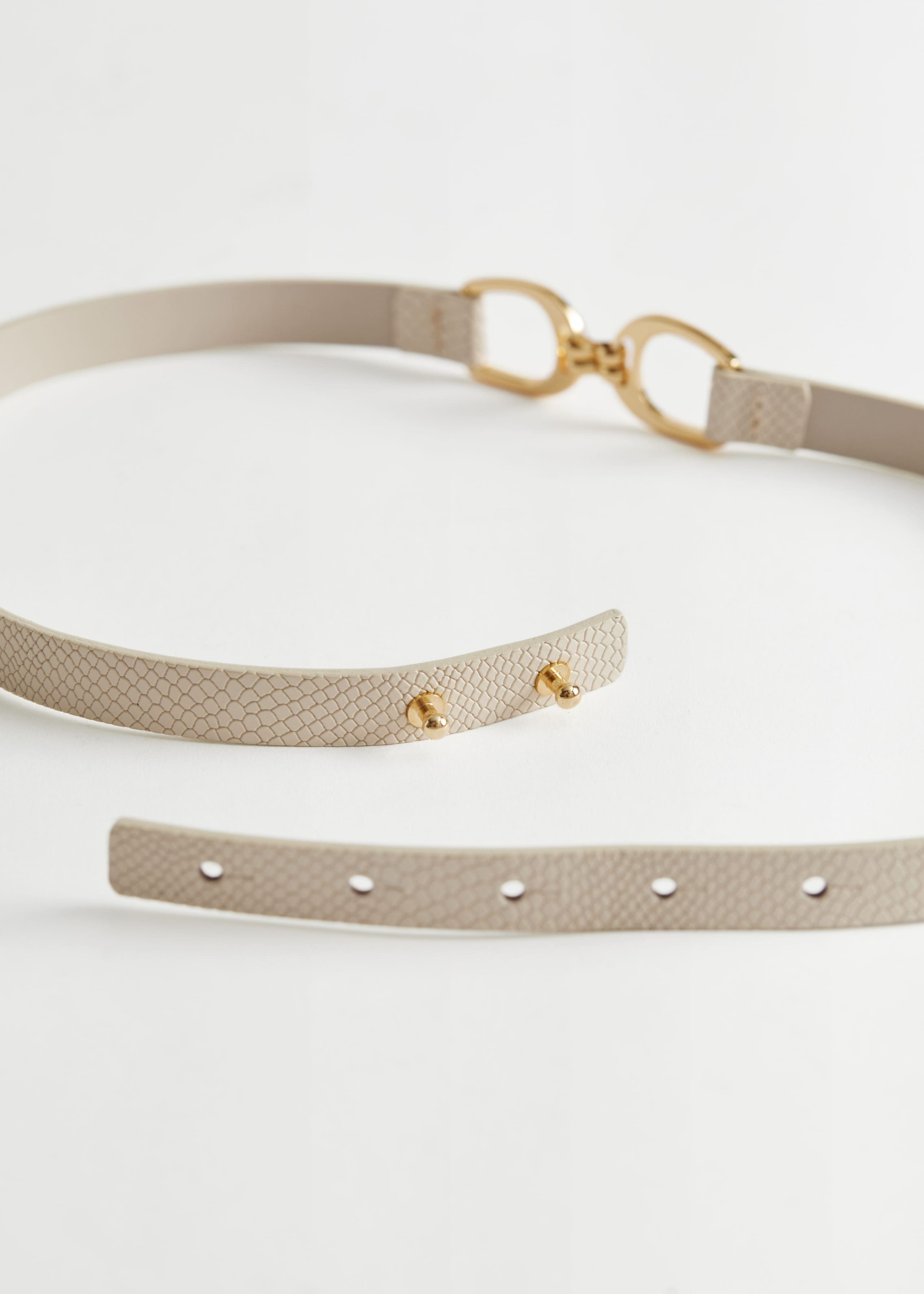 CrocLeatherBuckleBelt - {{variantName}} - Descrizione dettagliata