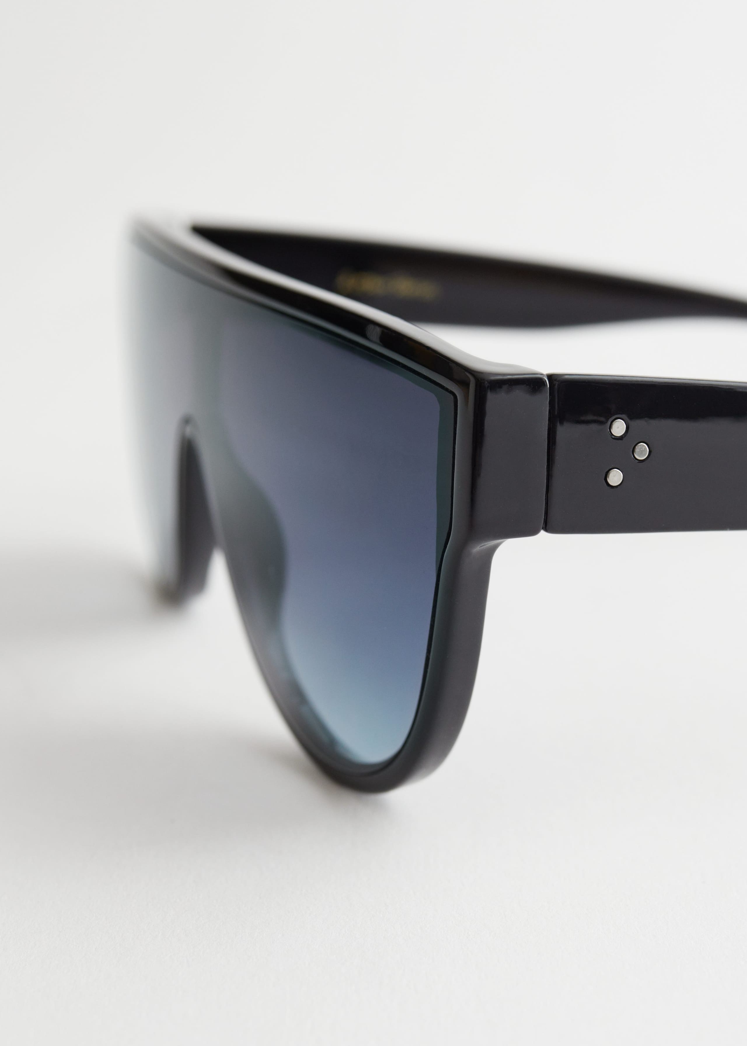 Shield Sunglasses - {{variantName}} - Descrizione dettagliata