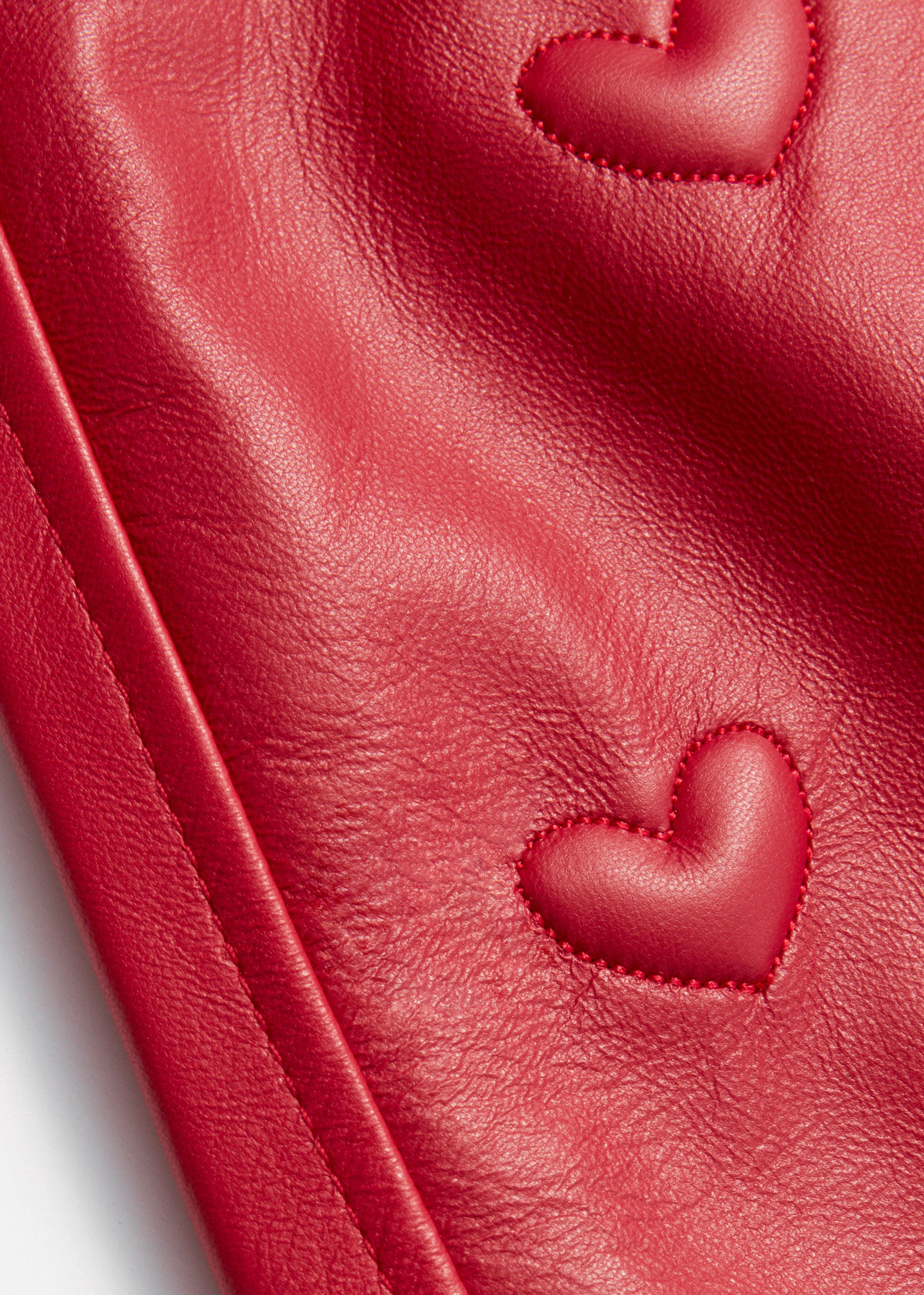 Image of Heart-Embossed Leather Mini Skirt