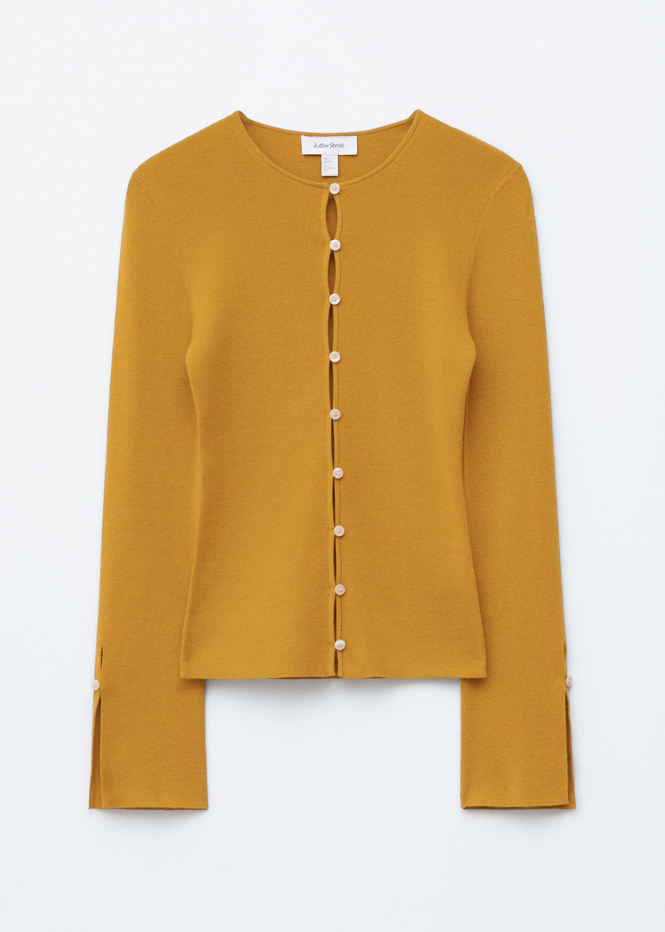 Vis større bilde: Figurnær cardigan i ull - Sennepsgul - DAME | H&M NO 6