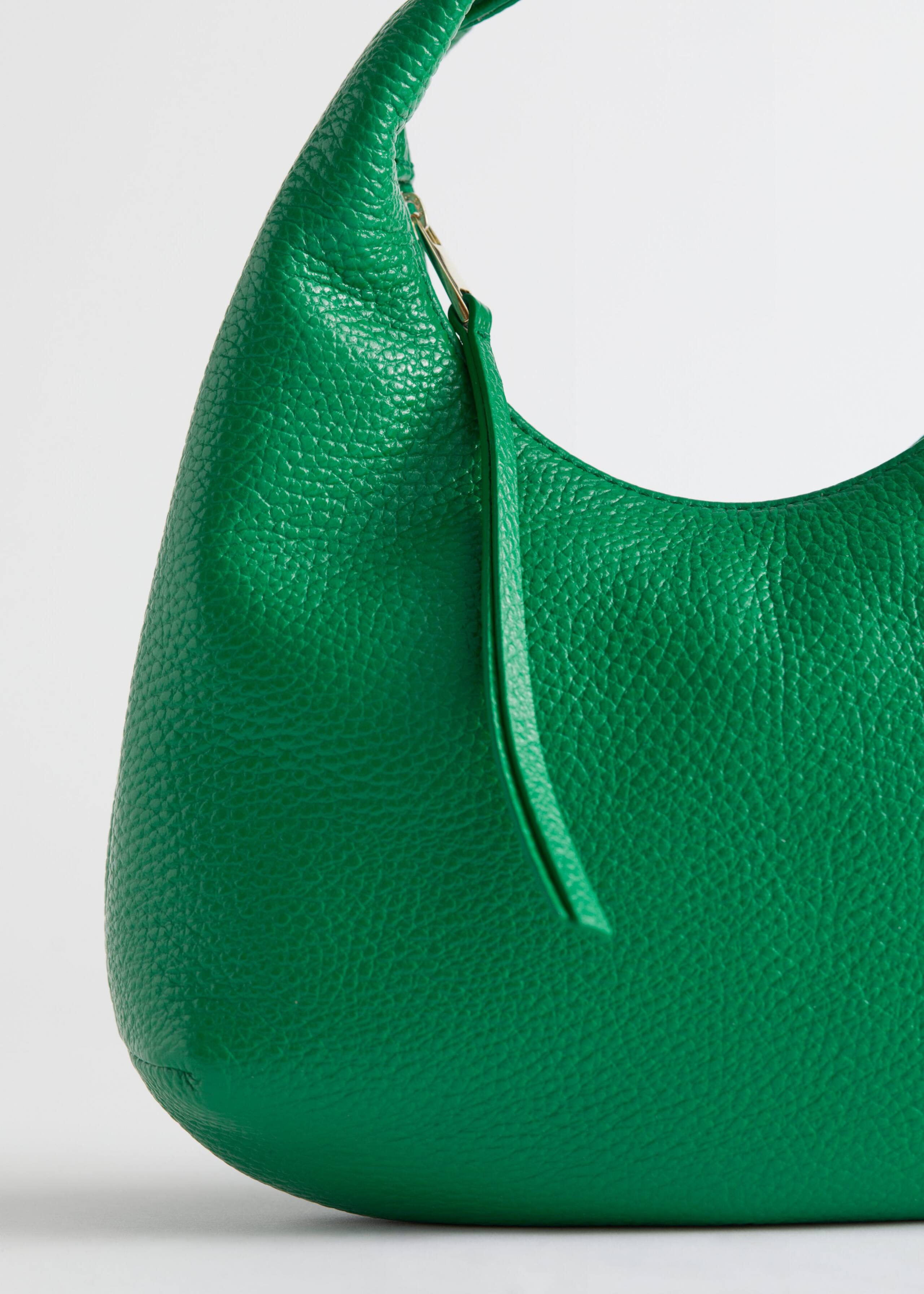 Leather Hand Bag - {{variantName}} - Descriptive Detail