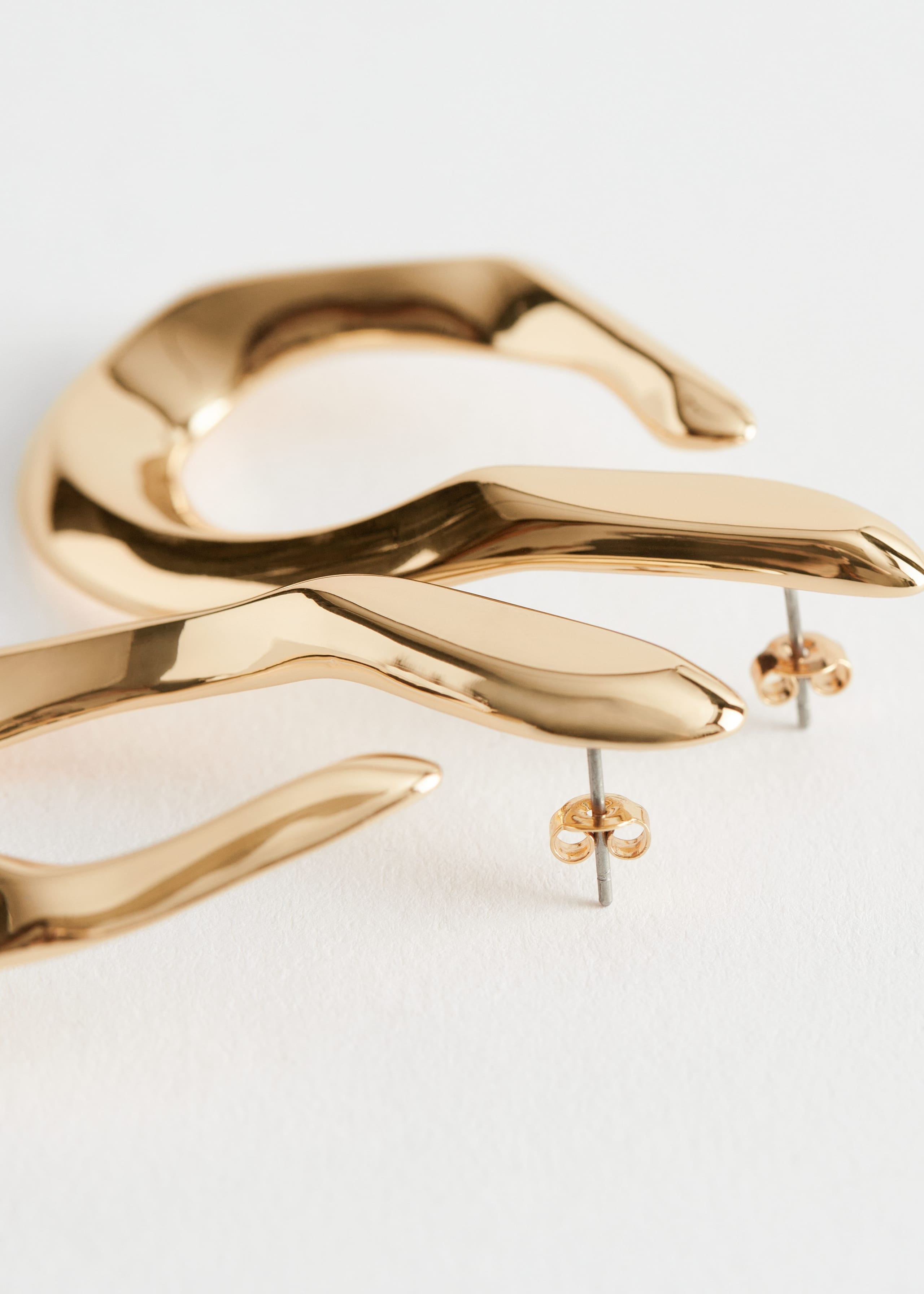 DropHoopEarrings - {{variantName}} - Detalle descriptivo