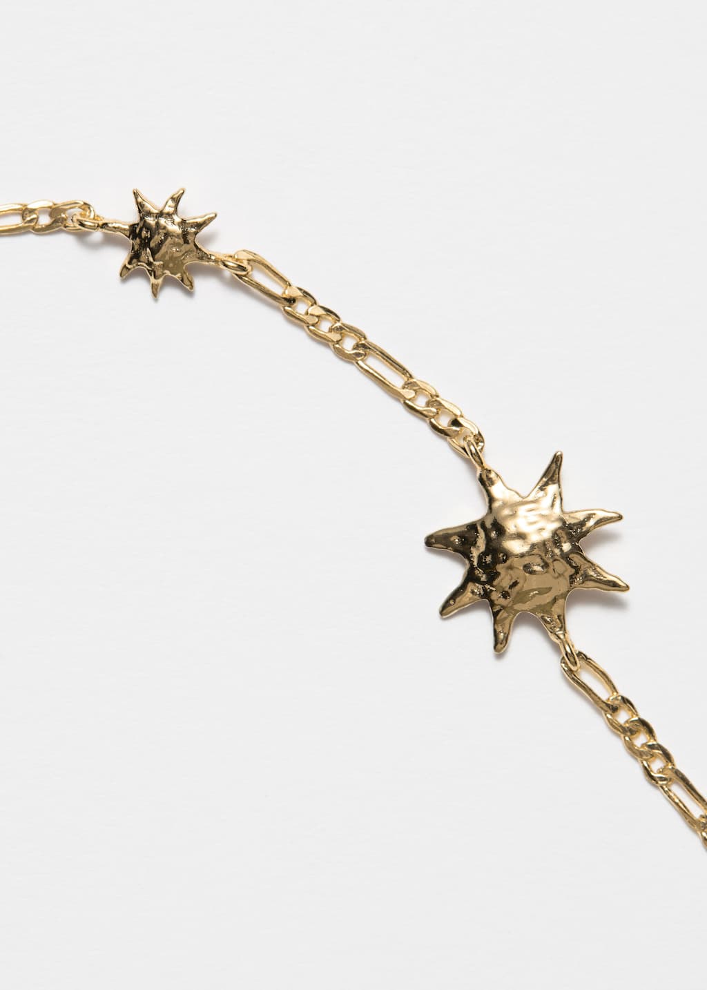 Pulsera con dijes de soles - {{variantName}} - Detalle descriptivo