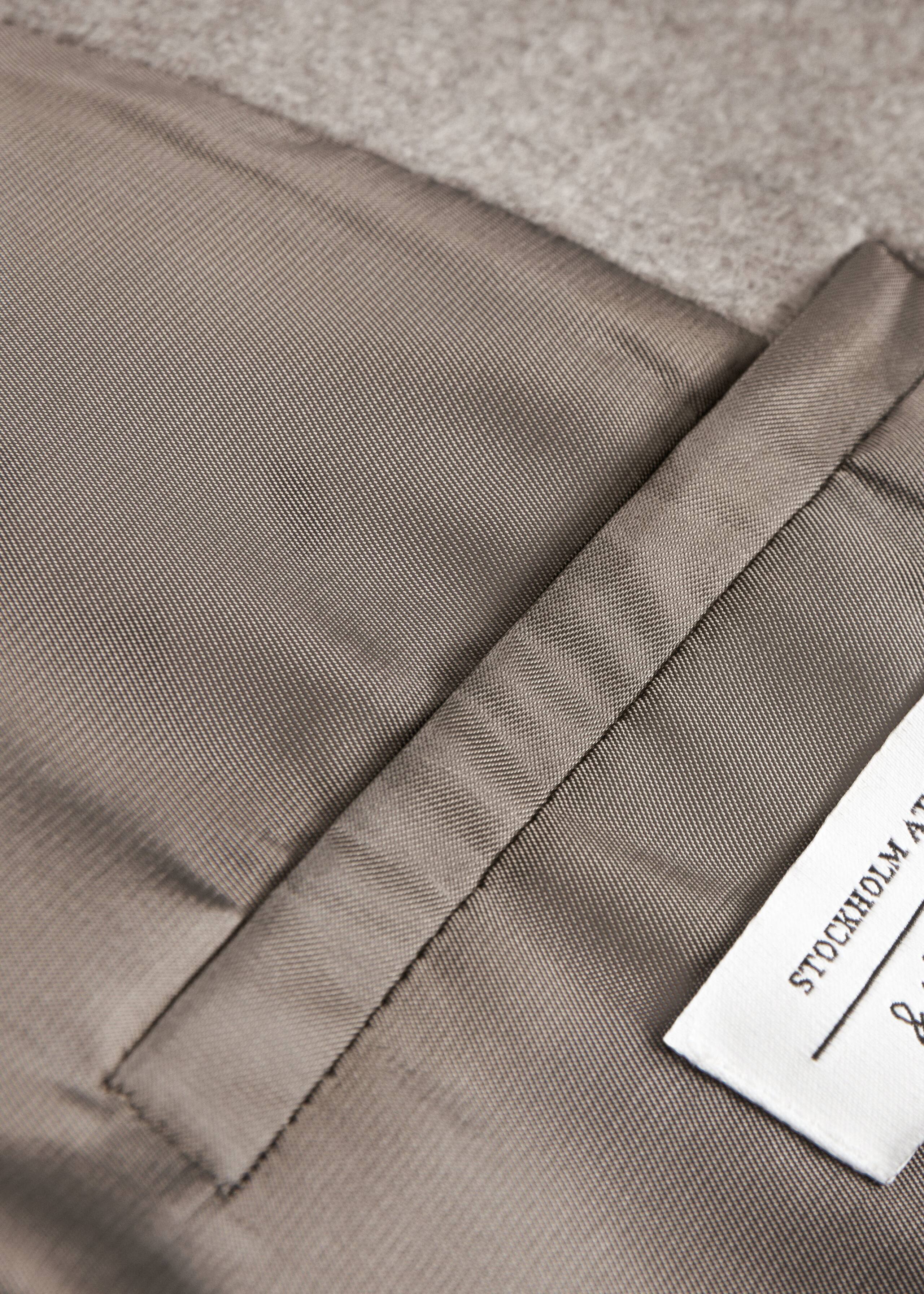 RelaxedFitWoolCoat - {{variantName}} - Descrizione dettagliata