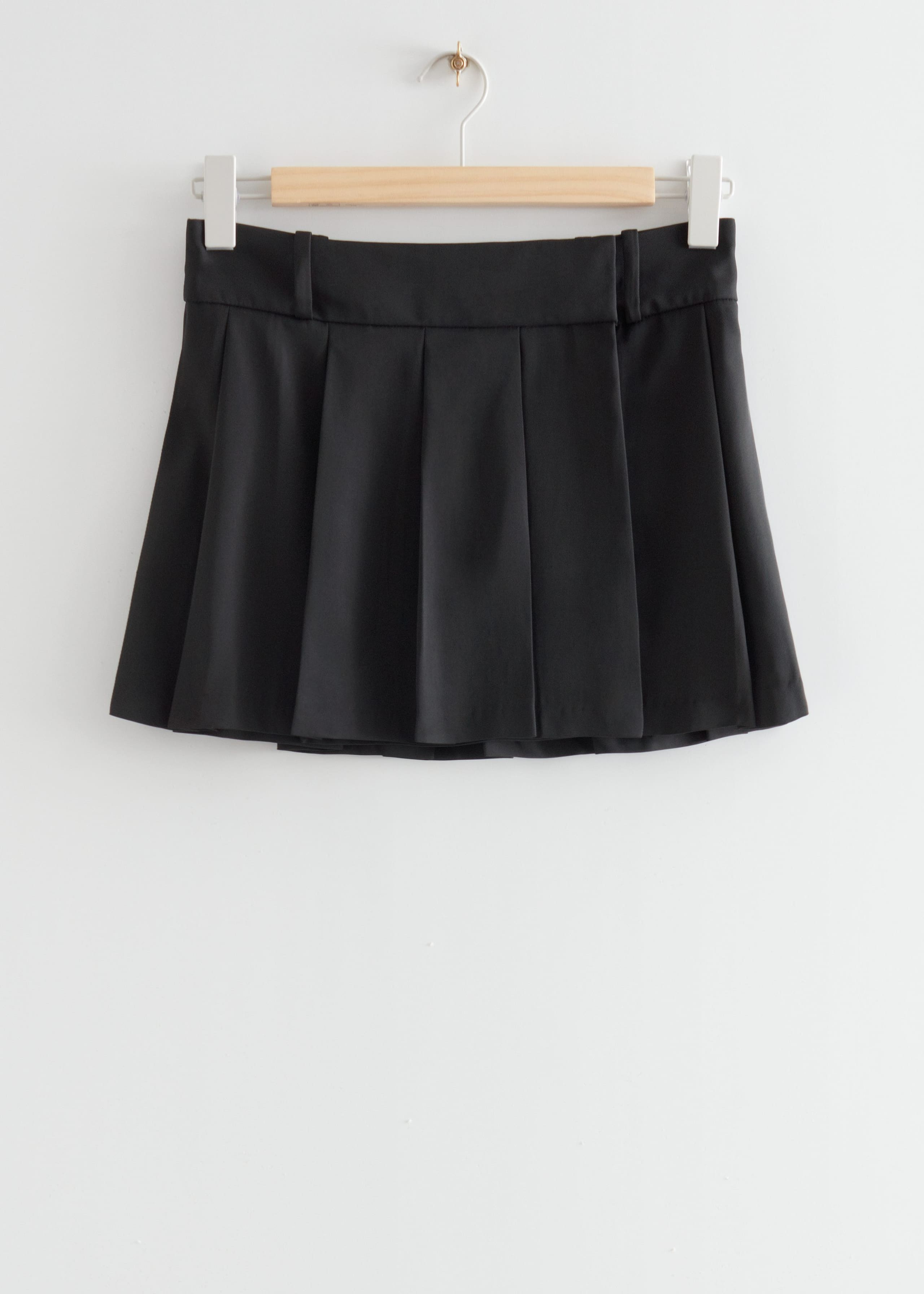 PleatedMiniSkirt - Black - Natura morta