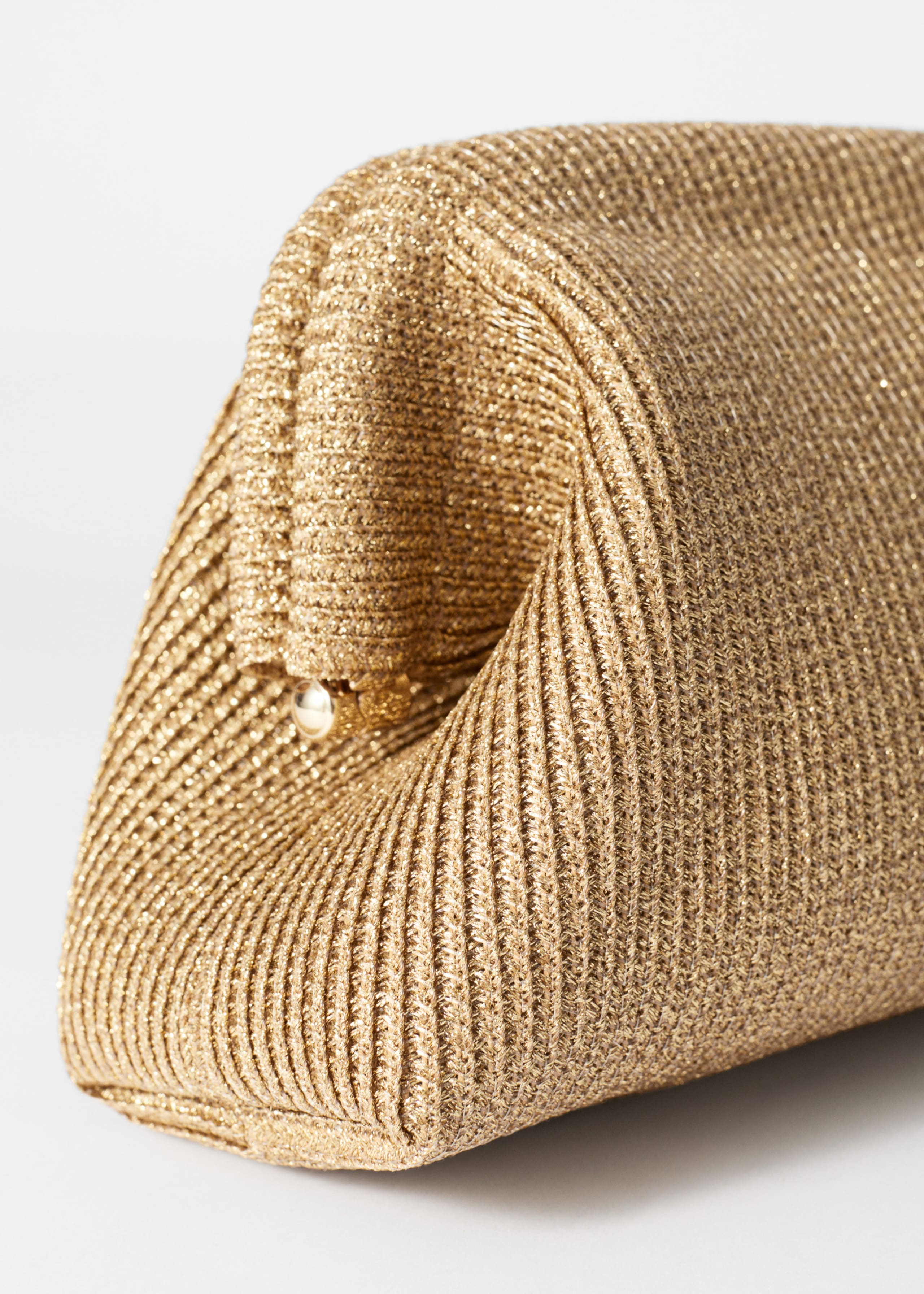 Clutch dorata - {{variantName}} - Descrizione dettagliata