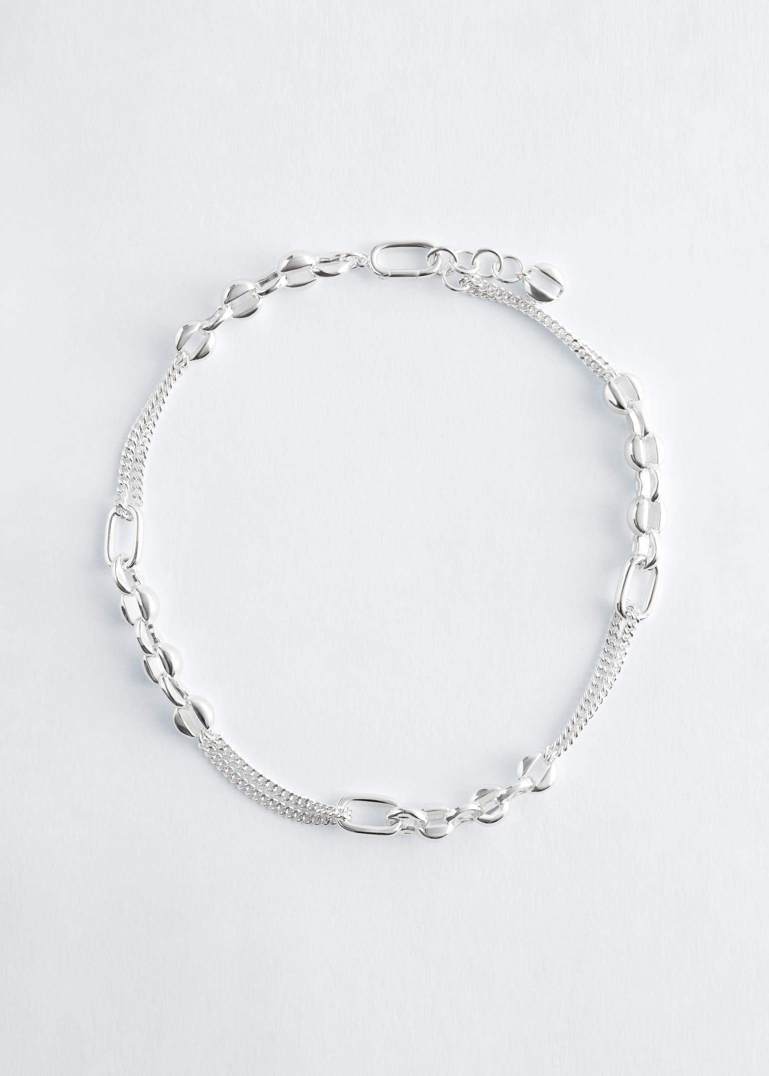 Gliederkette aus verschiedenen Materialien - Silber/Gold