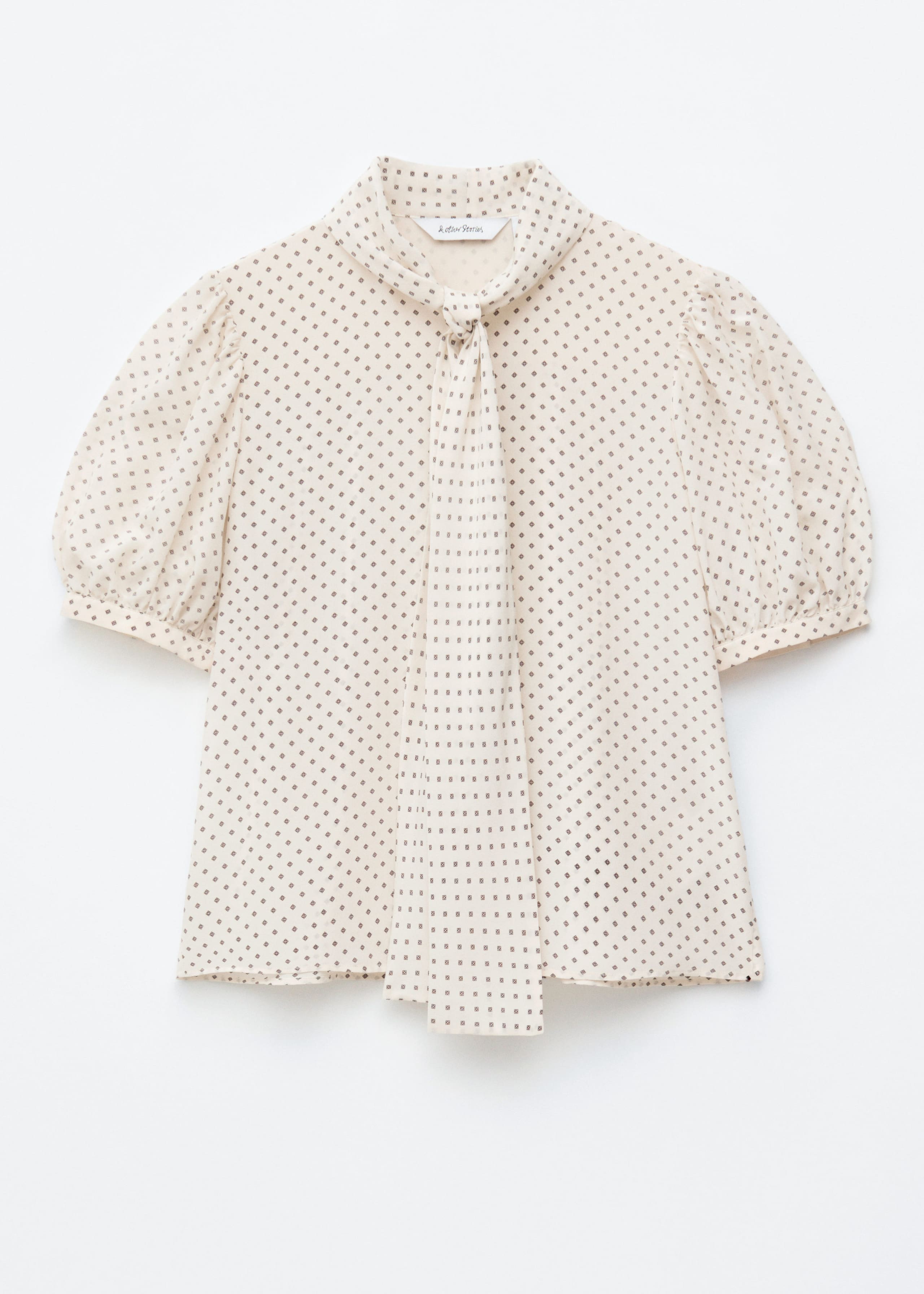 Image of Jedwabna bluzka z nadrukiem i wiązaniem przy szyi