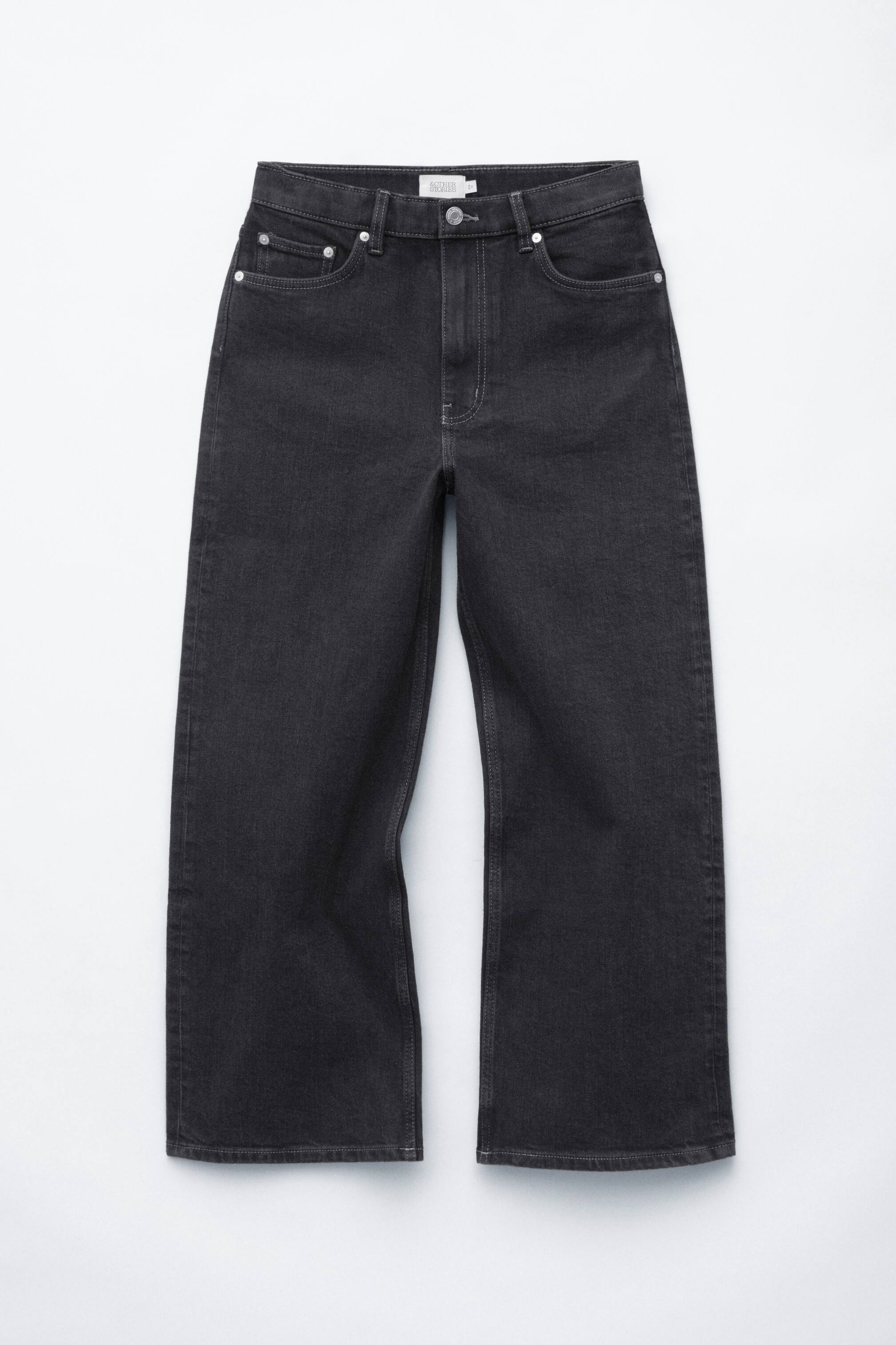Grotere afbeelding bekijken: Donkergrijze jeans met hoge taille worden van voren getoond, met een klassieke five-pocket-stijl, een rits- en knoopsluiting, riemlussen en een regular fit met een cropped wide leg.