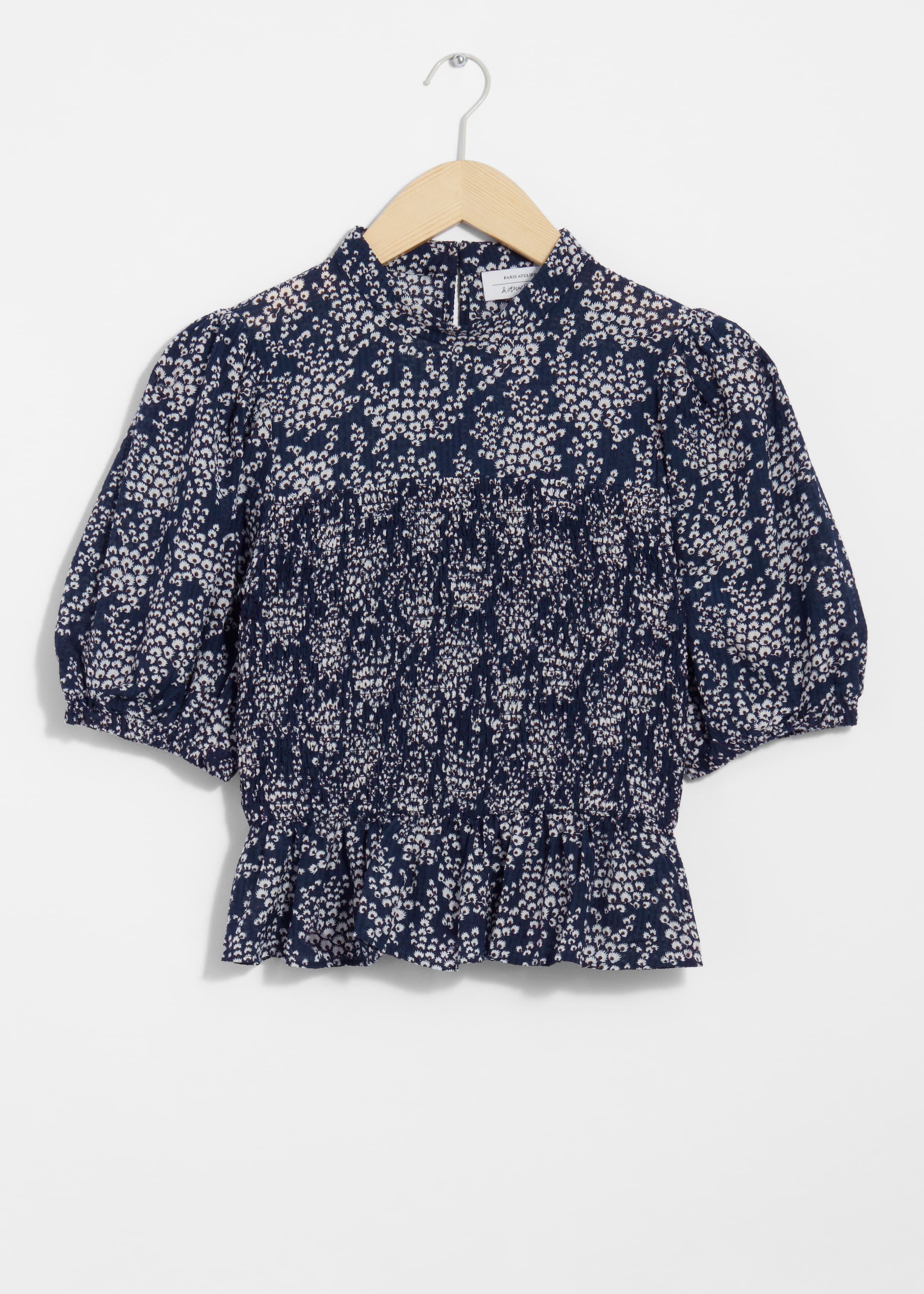 Größeres Bild ansehen: Gesmokte Bluse mit Schößchen - Navyblauer Print - Ladies | H&M DE 1