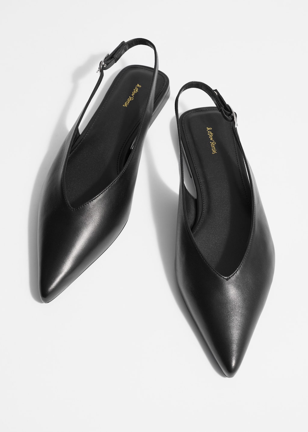 Image of Zapatos de salón puntiagudos con tira trasera