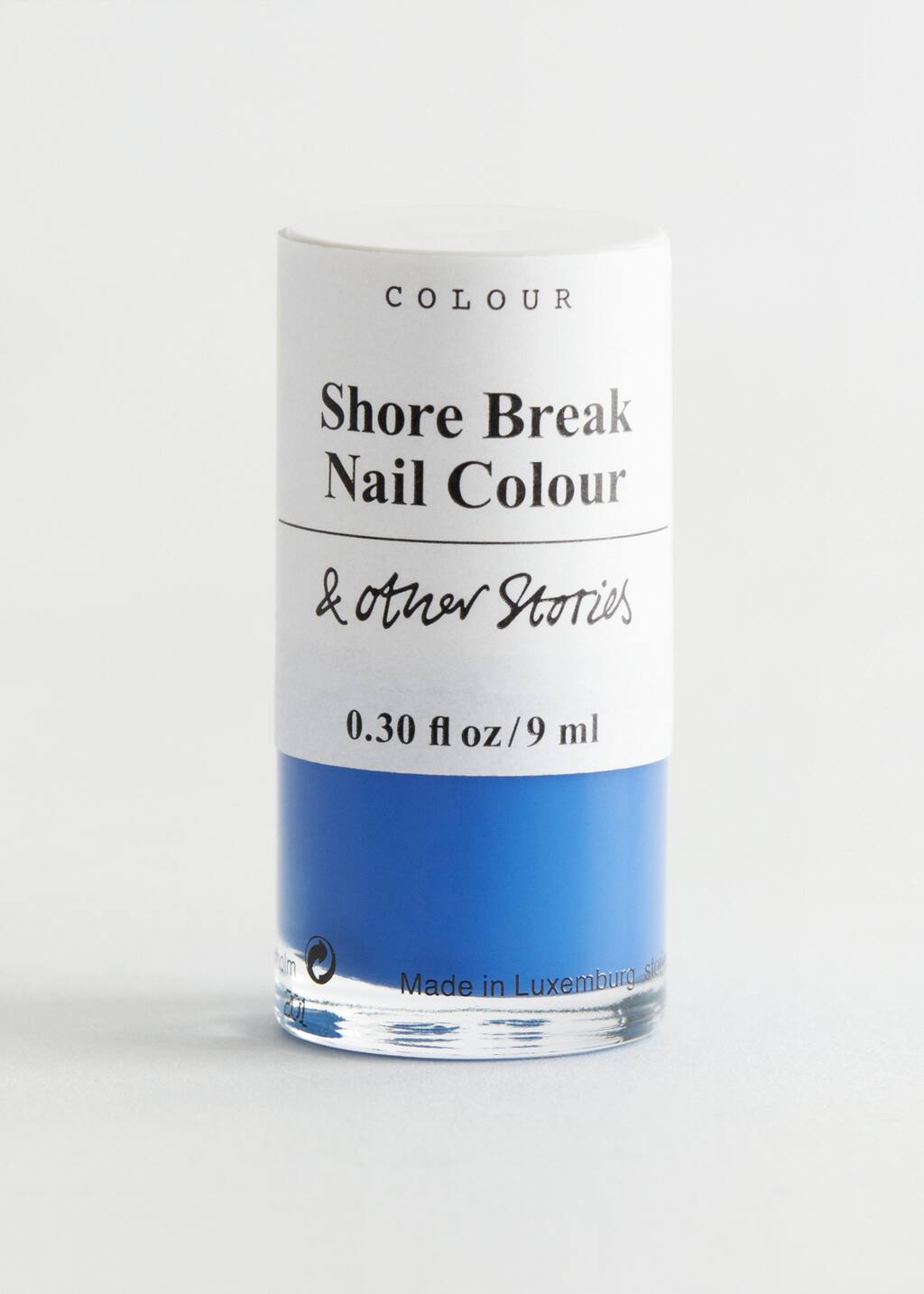 Laca de uñas - Sunlit Coral - Bodegón