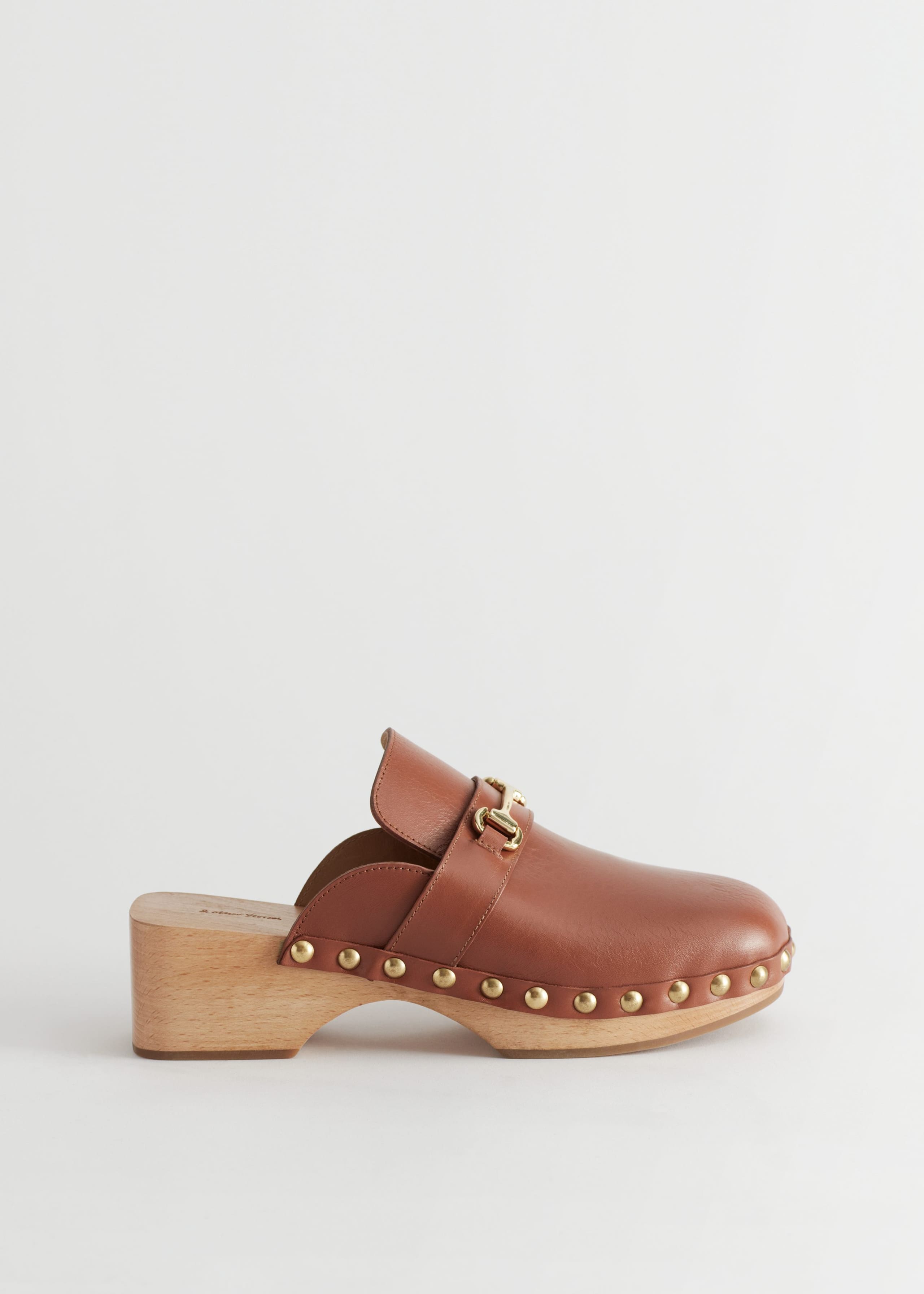 Image of StuddedLeatherWoodenDecoClogs