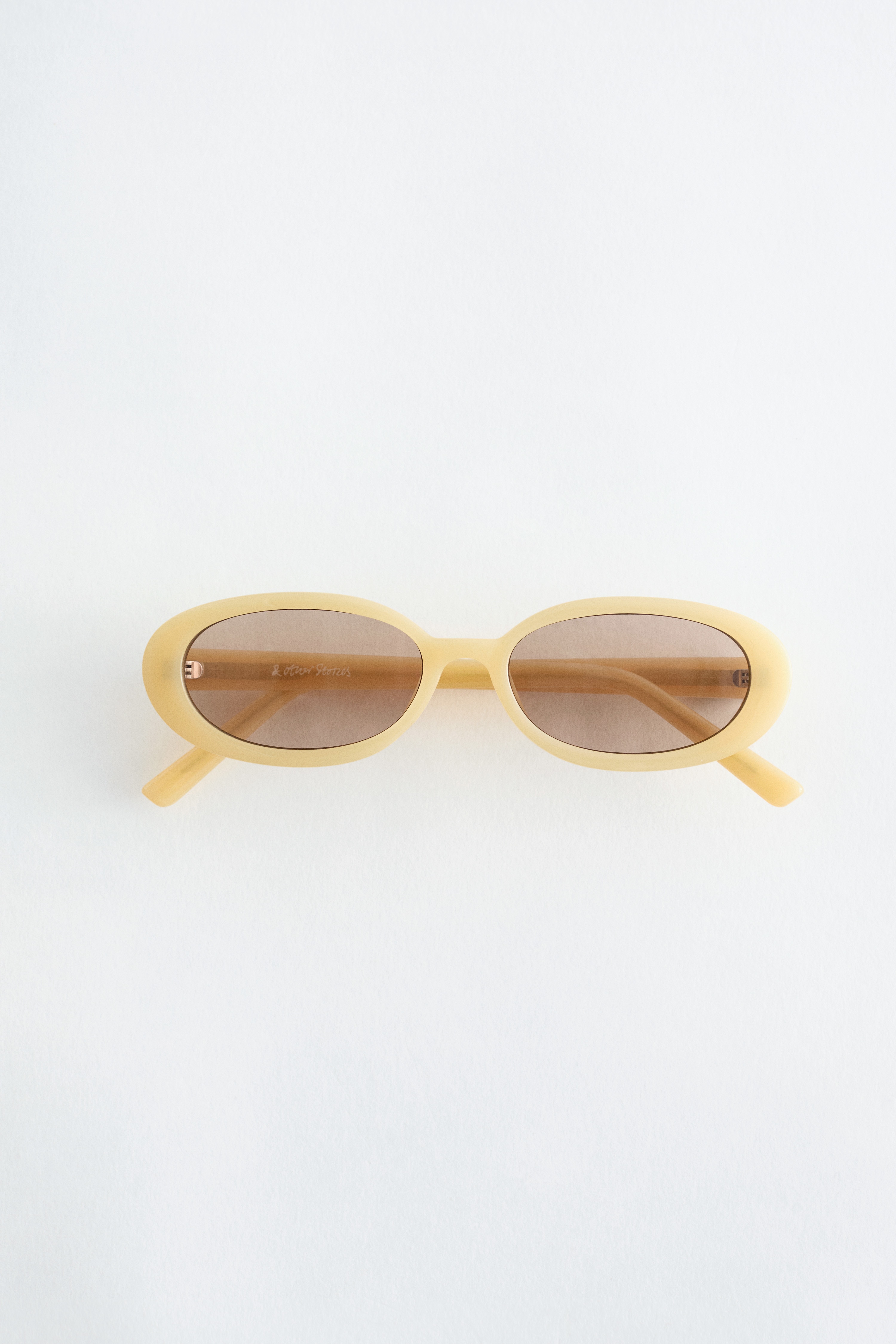 Ovale Sonnenbrille mit schmalem Rahmen - Gelb/Braun