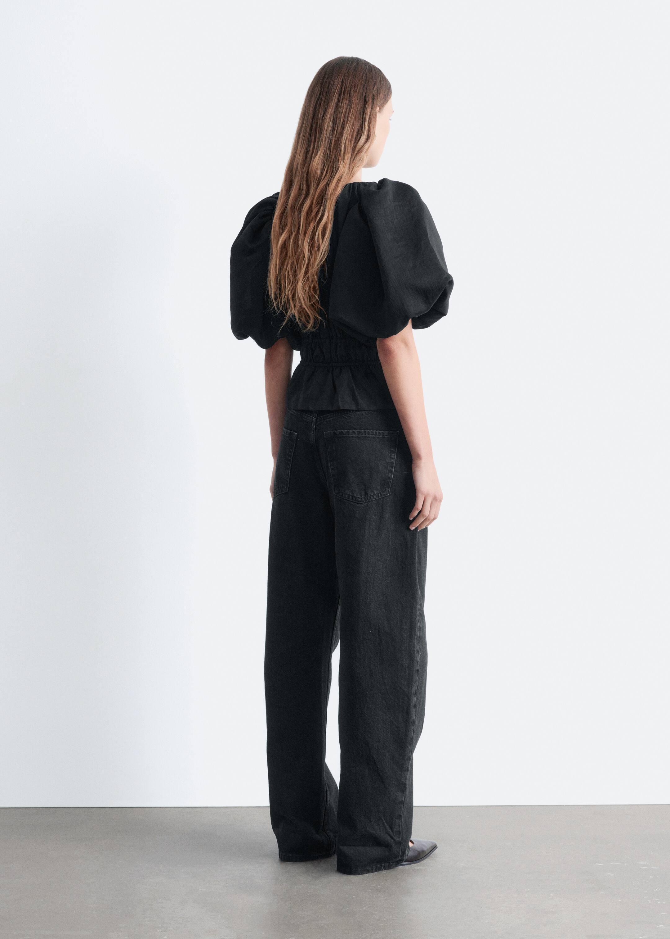 Visa större bild: Peplumtopp med puffärm - Svart | H&M SE 5