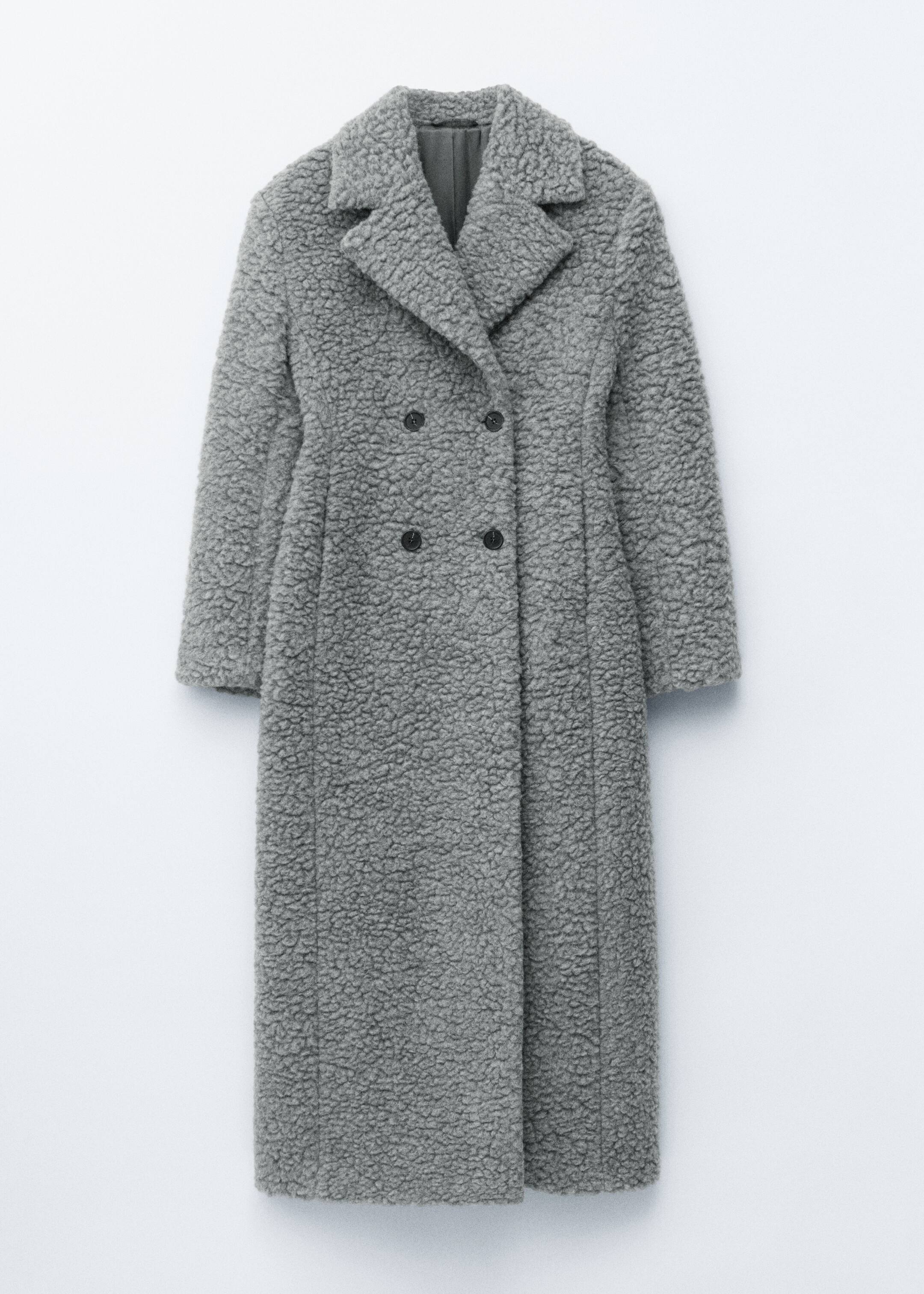 View larger image: A gray double-breasted coat, featuring a textured faux shearling fabric, is displaying notch lapels and four dark buttons on its front, with the coat extending to a long length.