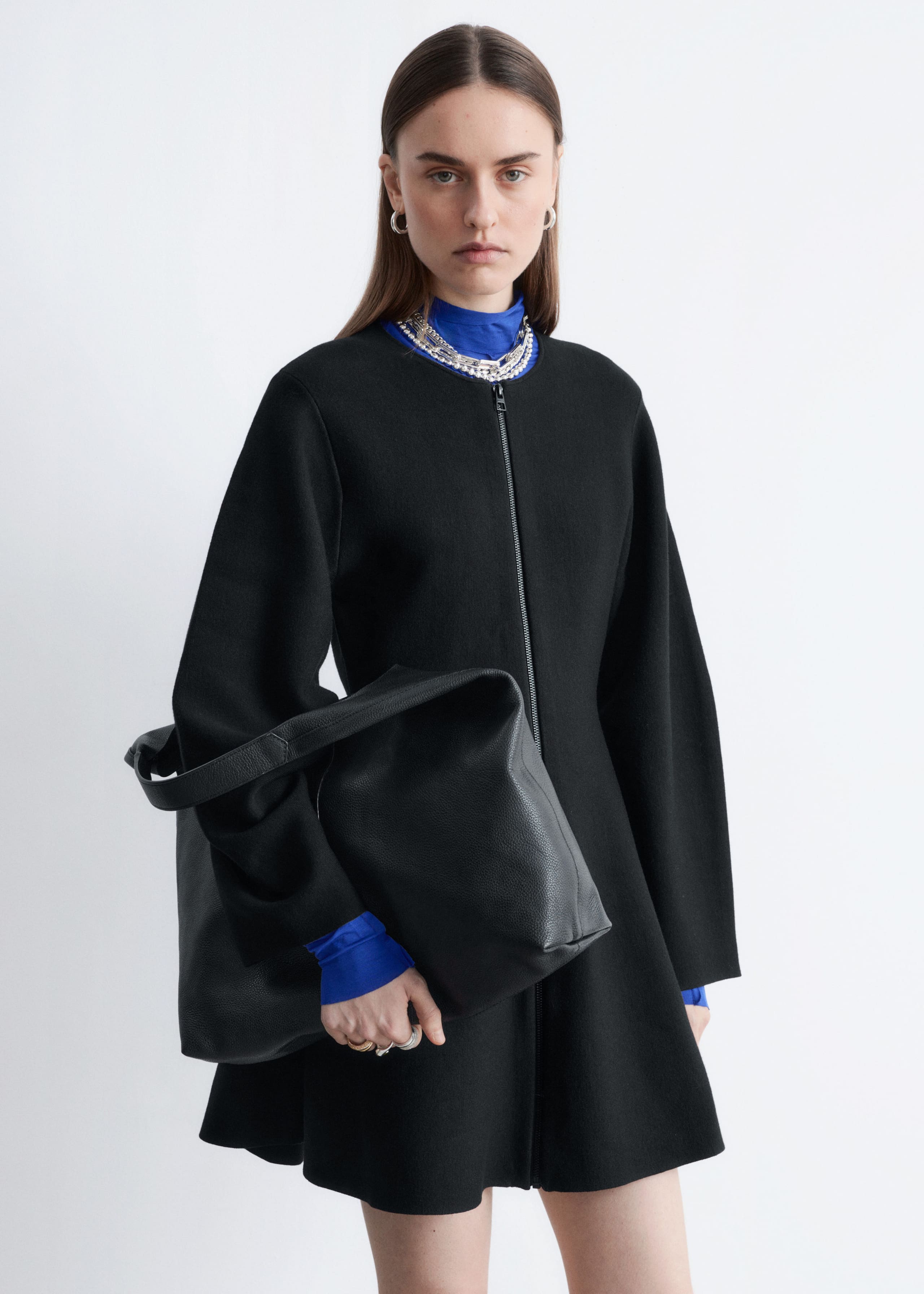 Image of Sculptural-Sleeve Knitted Mini Dress