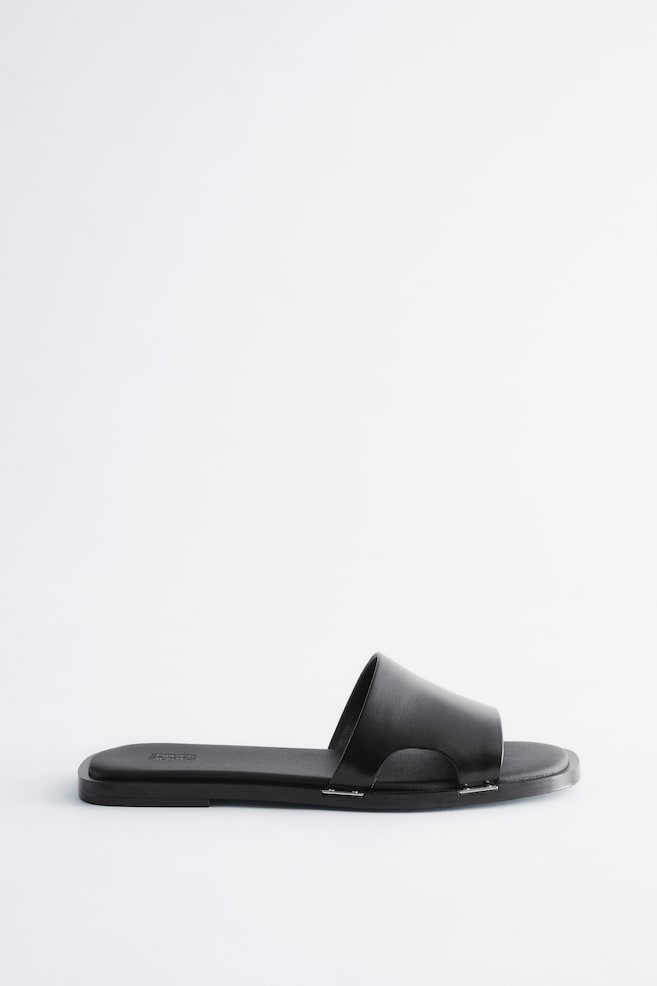 Mules en cuir à détails en métal - Noir/Blanc - 1