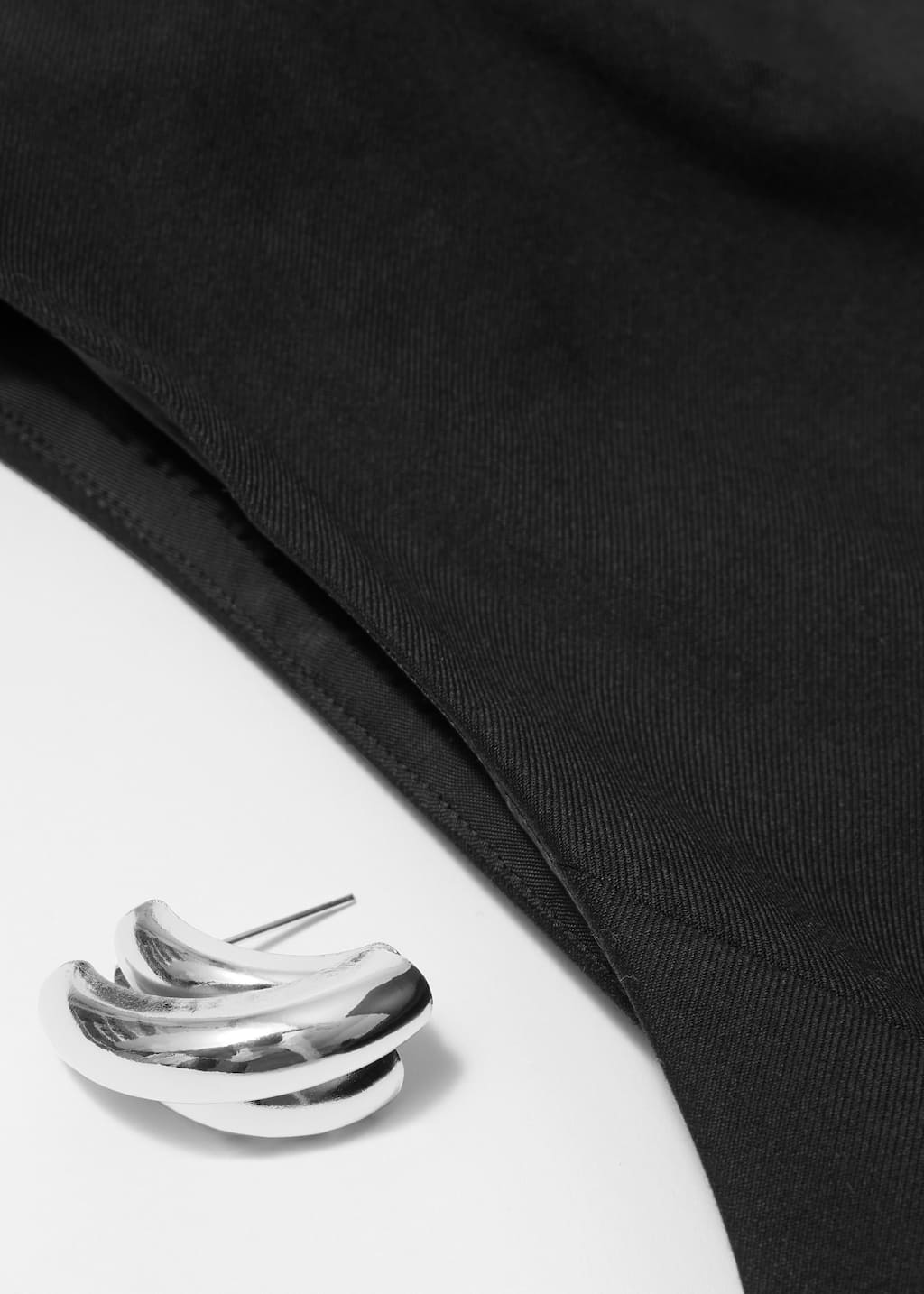 Image of Chaleco con detalle de anillos