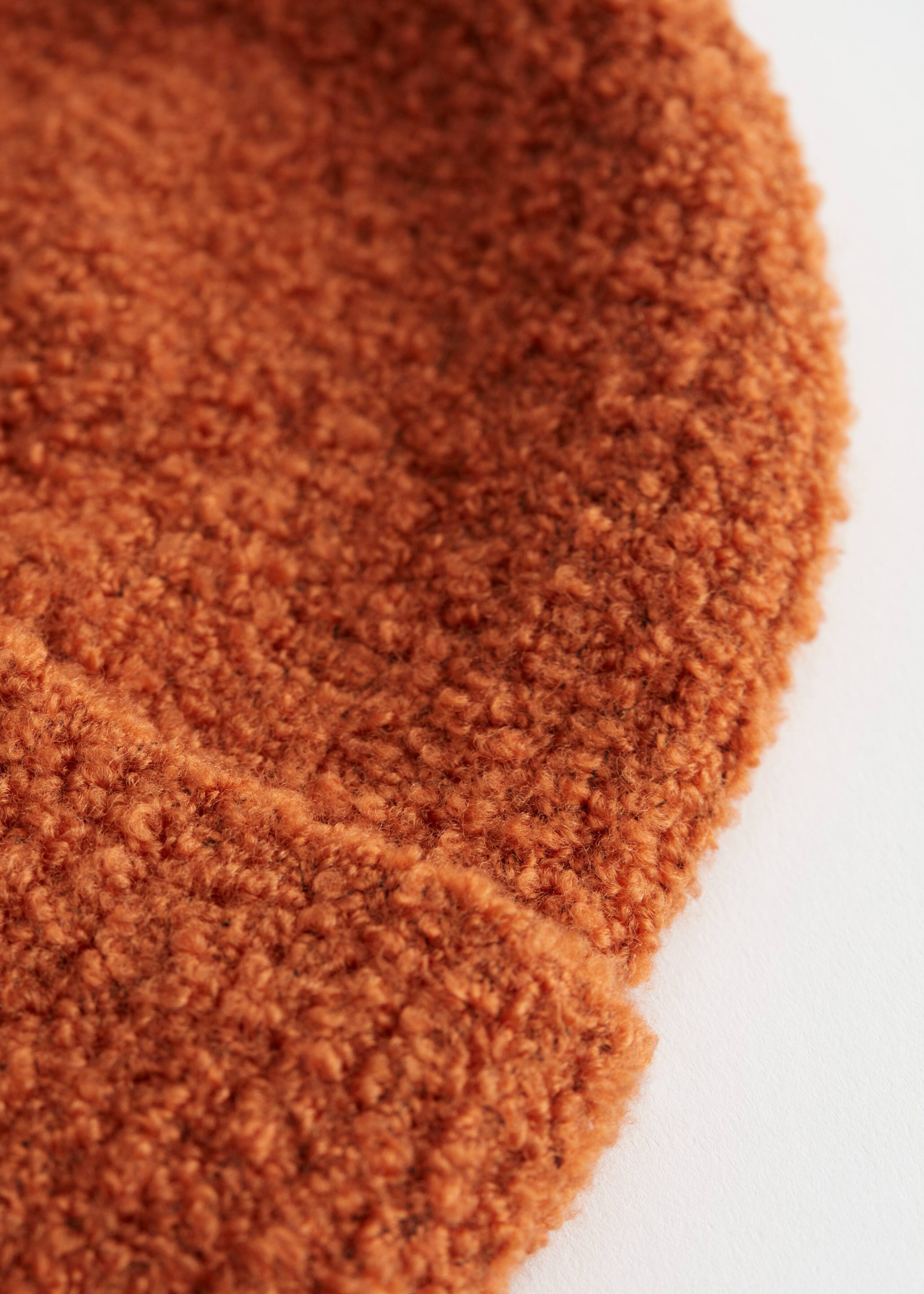 ChunkyBouclKnitBeanie - {{variantName}} - Detalle descriptivo