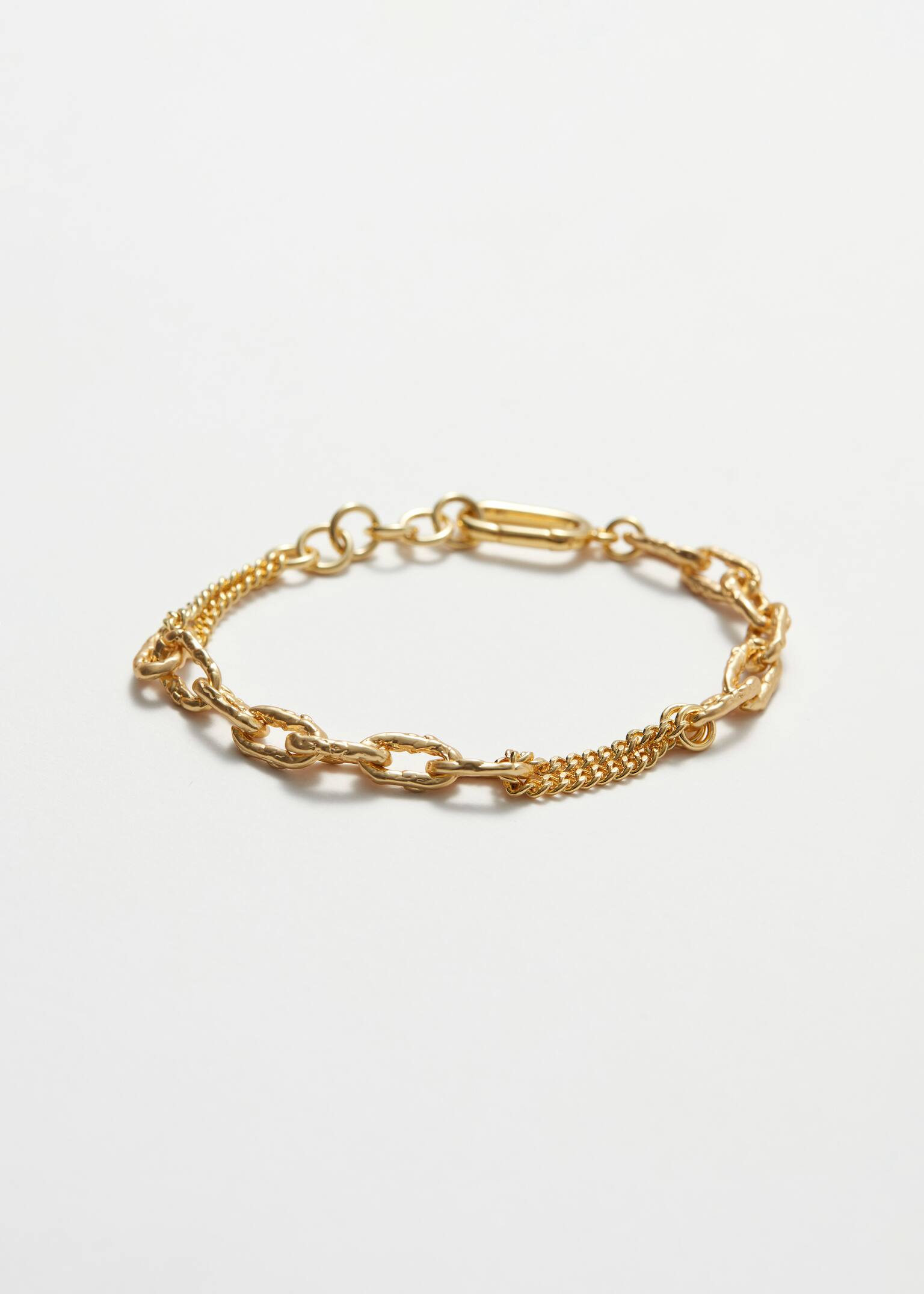 Markantes Armband mit skulpturierten Gliedern - Gold