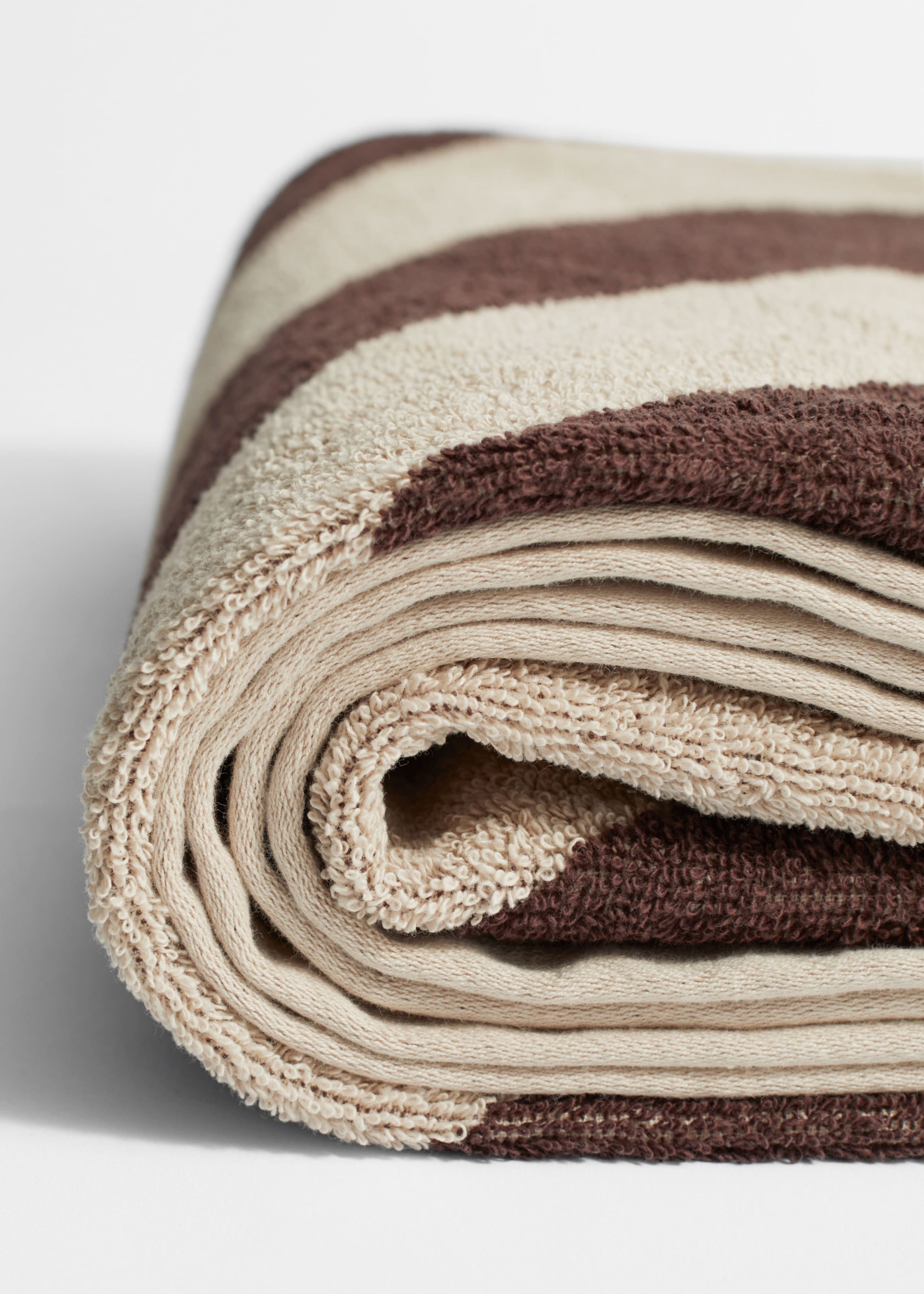 Cotton-Terry Beach Towel - {{variantName}} - Descriptive Detail