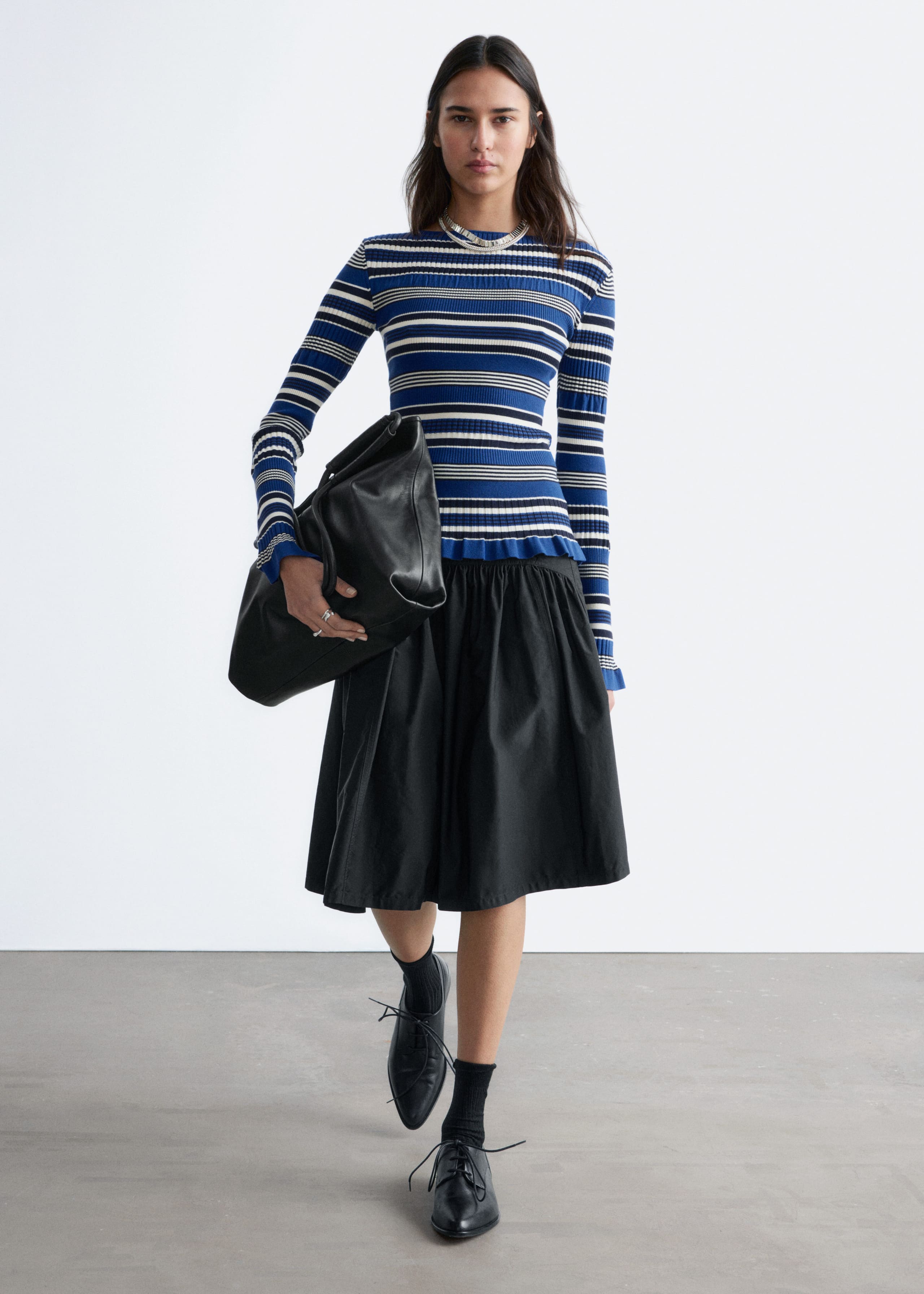 Image of Maglia a coste a maniche lunghe