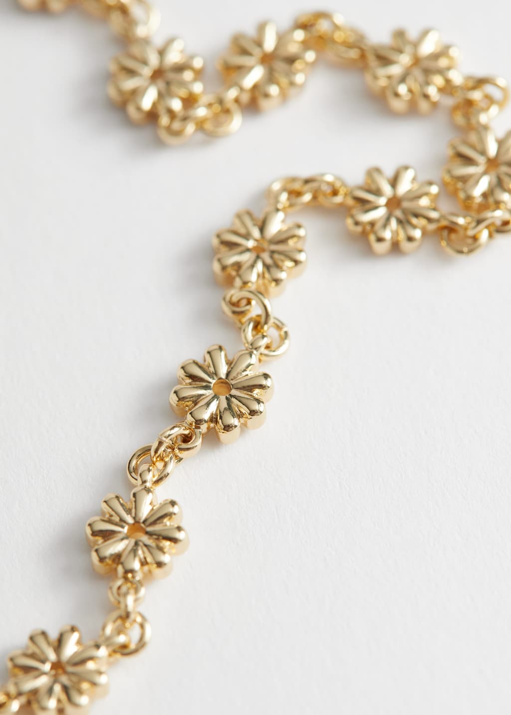 Collier à breloques pâquerettes - {{variantName}} - Descriptive Detail