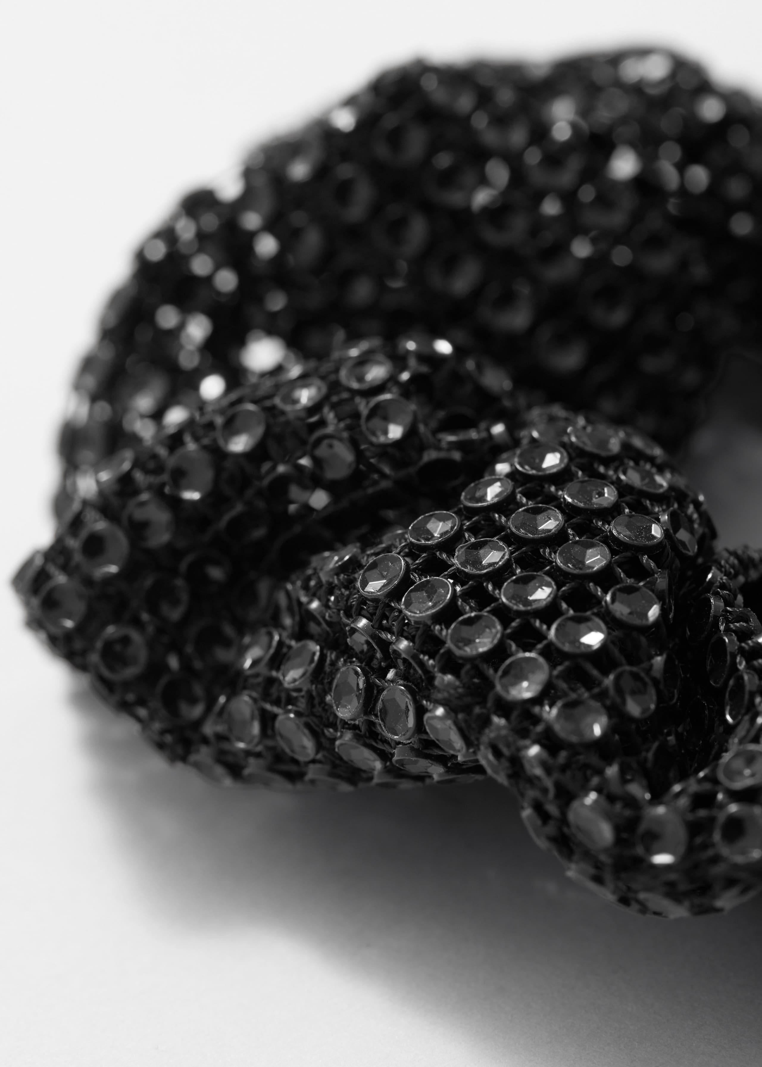 Coletero adornado con lentejuelas - {{variantName}} - Detalle descriptivo