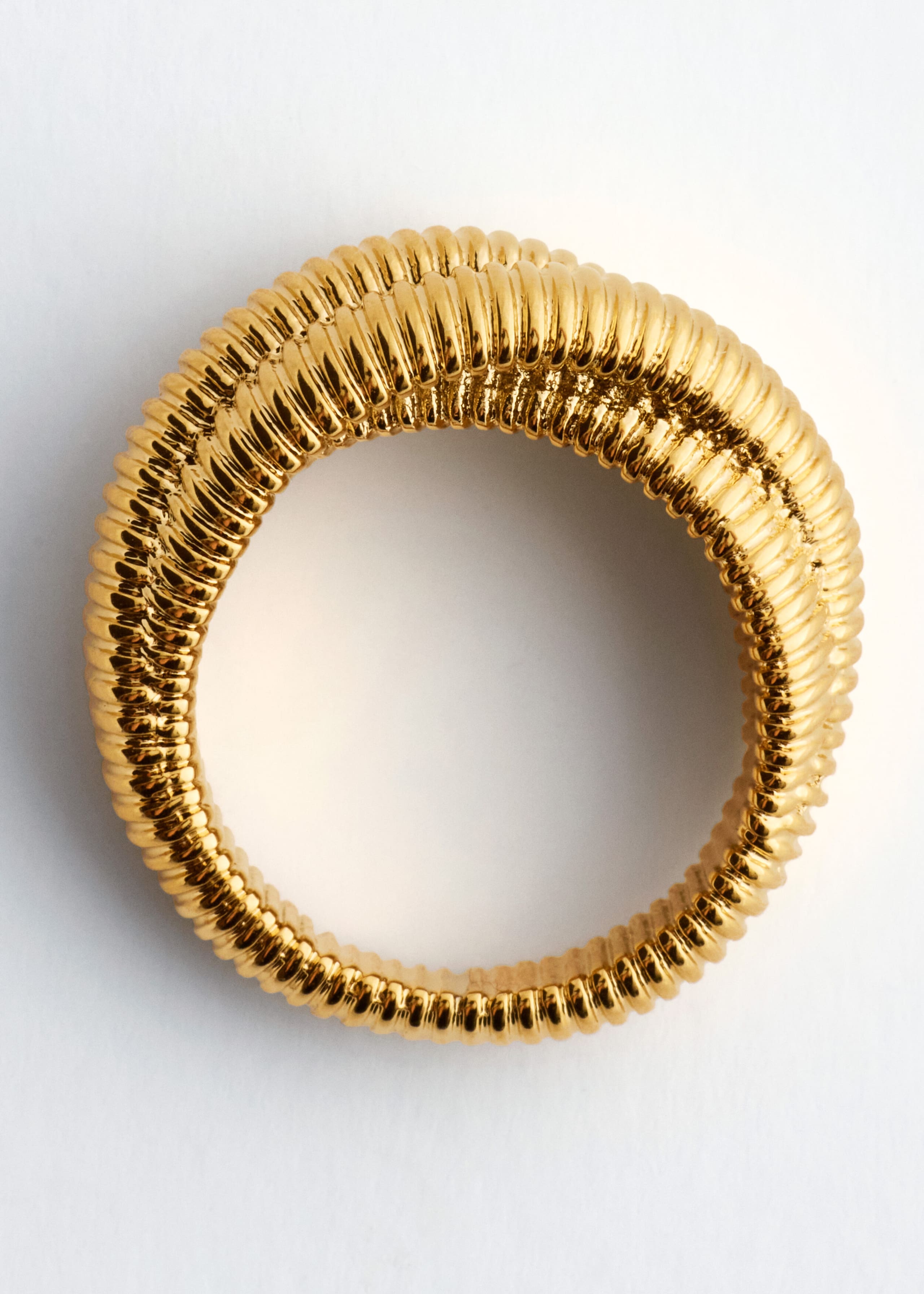 Plated Brass Twist Ring - {{variantName}} - Descriptive Detail