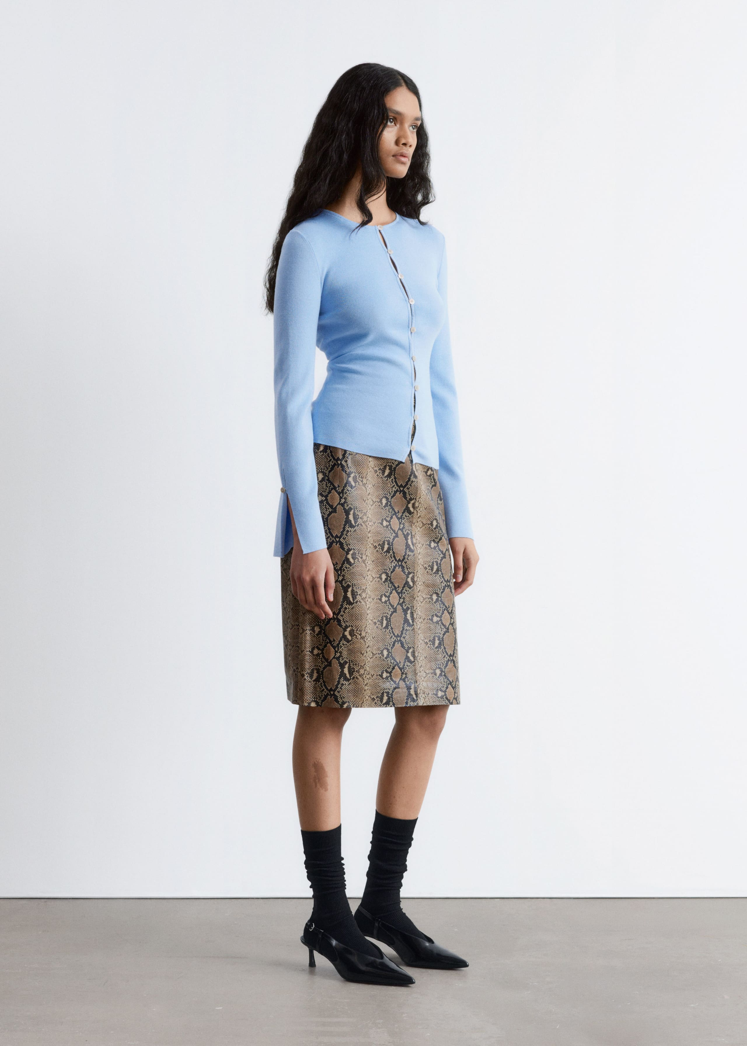 Image of Cardigan aderente in lana