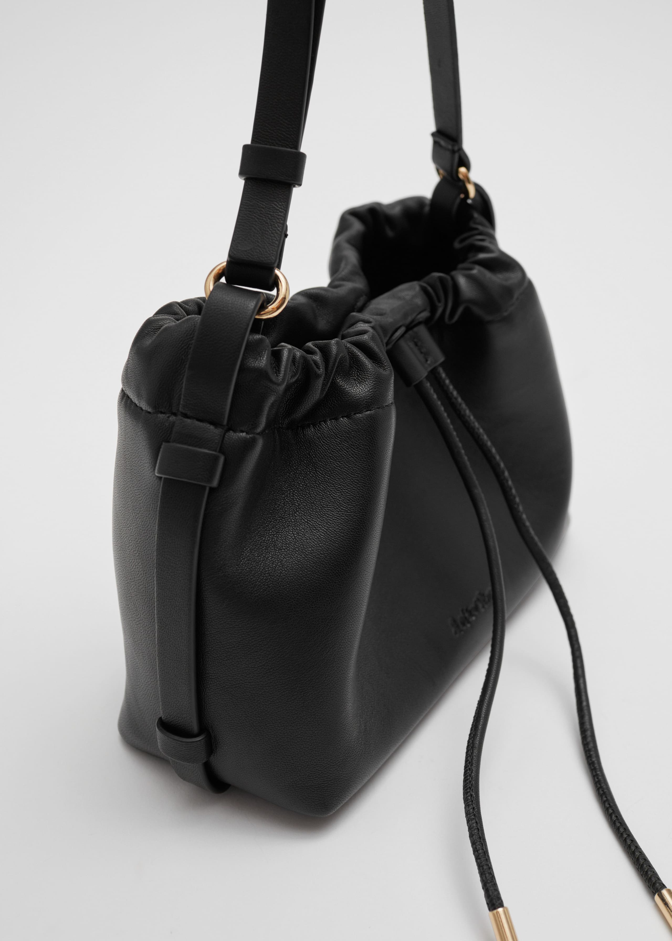 Leather Drawstring Tote - {{variantName}} - Descriptive Detail