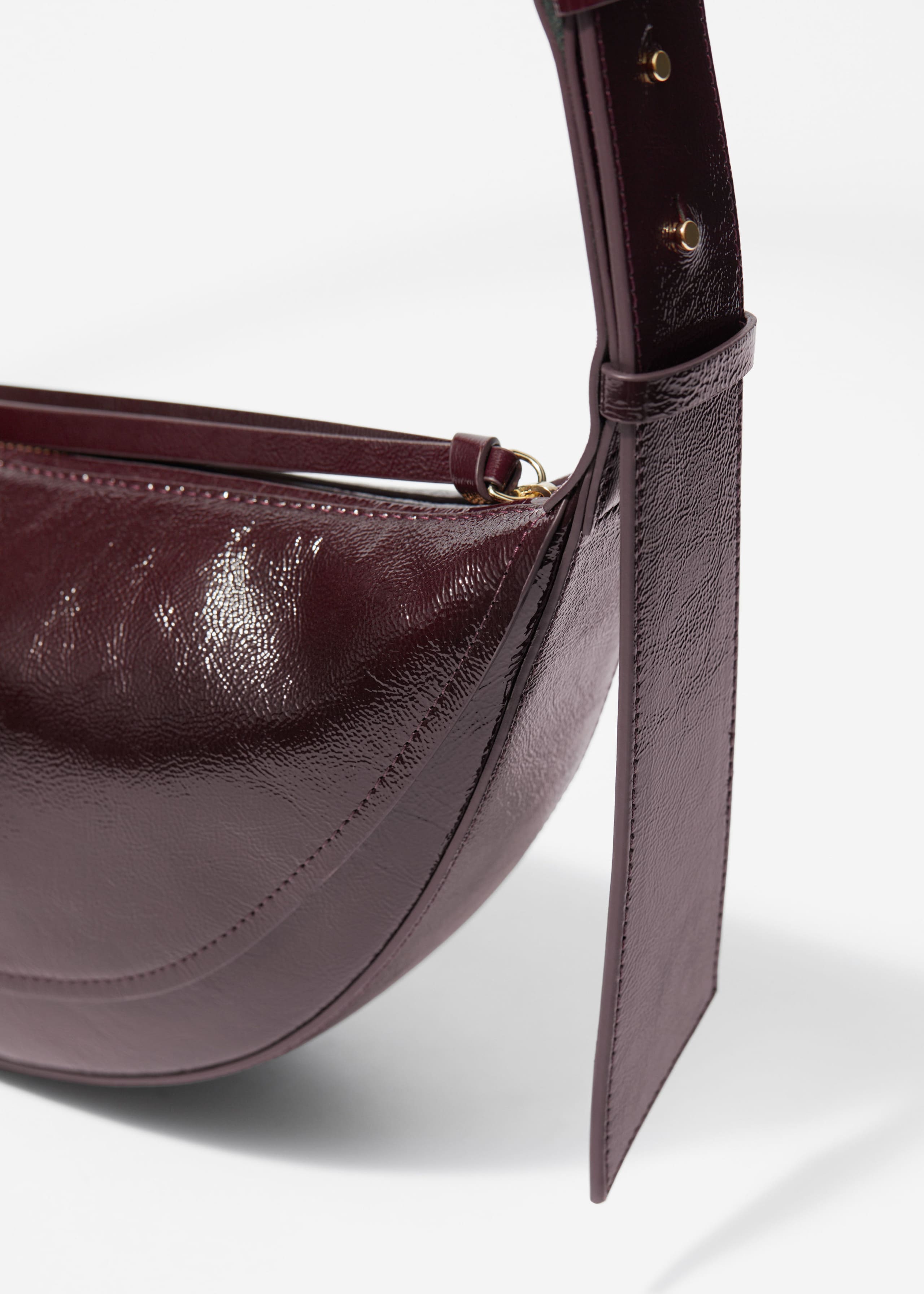 Borsa in pelle con pannelli - {{variantName}} - Descrizione dettagliata